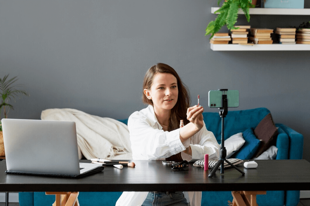woman recording on smart phone