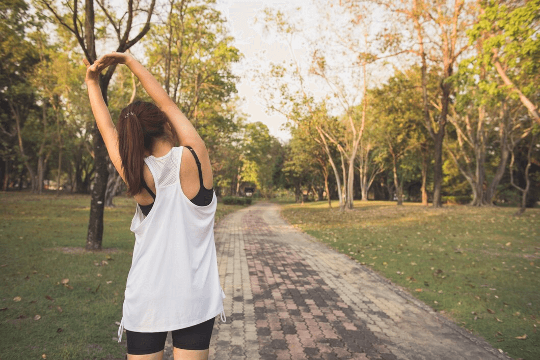 woman exercising outdoors