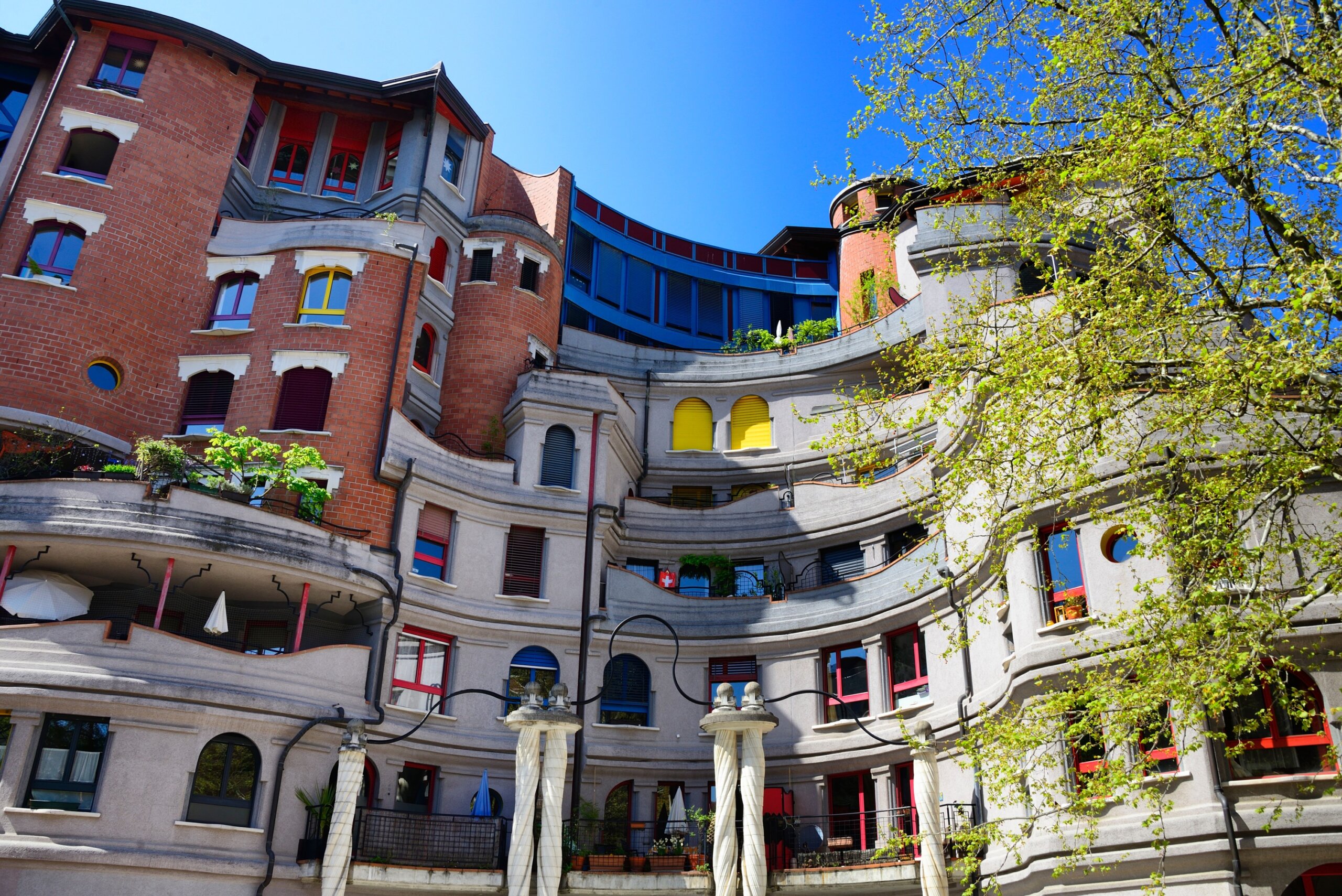 Geneva, Switzerland, Europe : Les Grottes quarter - Les Schtroumpfs, unique residential complex built in 1980s, these buildings recall works of Antoni Gaudi and Friedensreich Hundertwasser