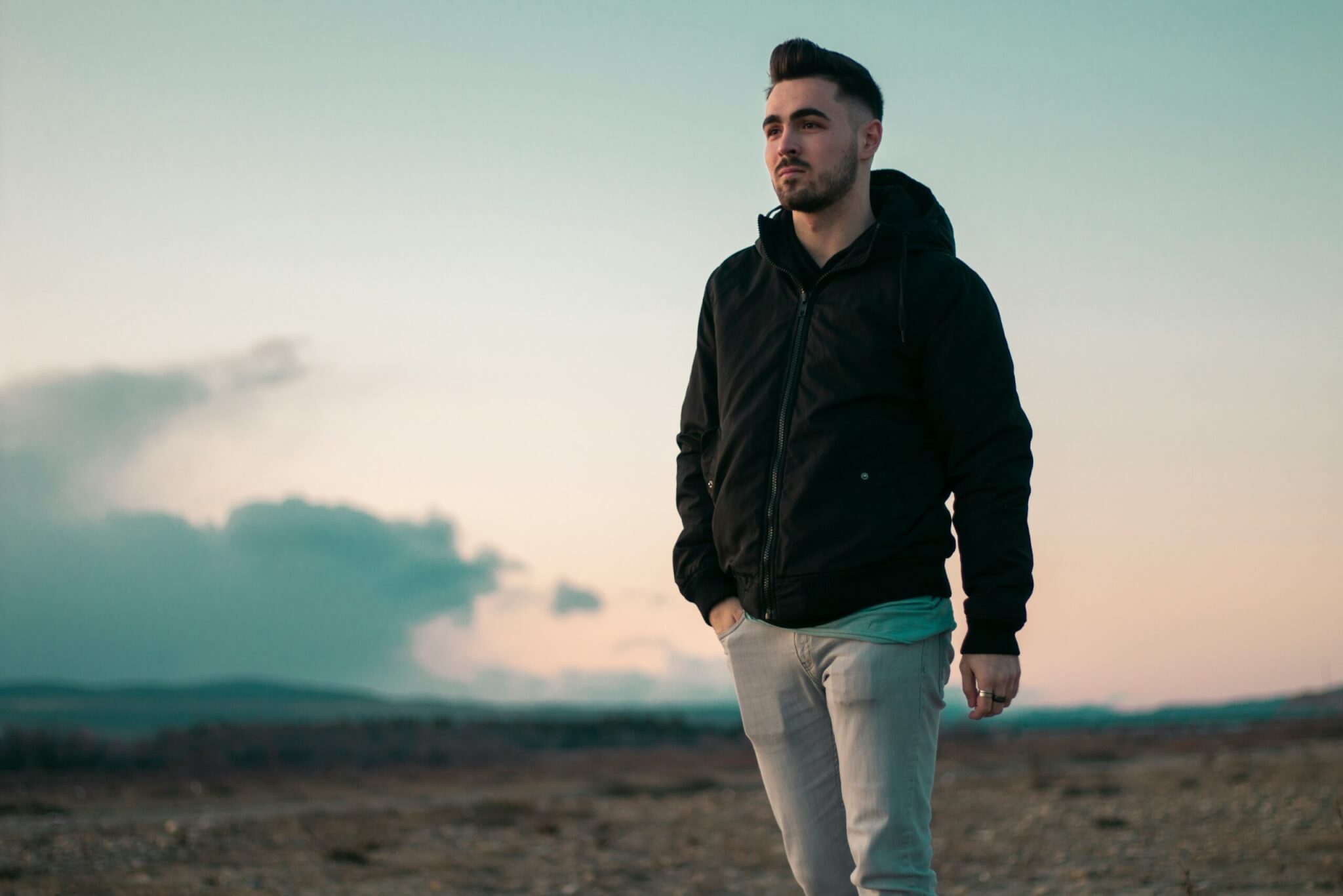 man in a black hoodie