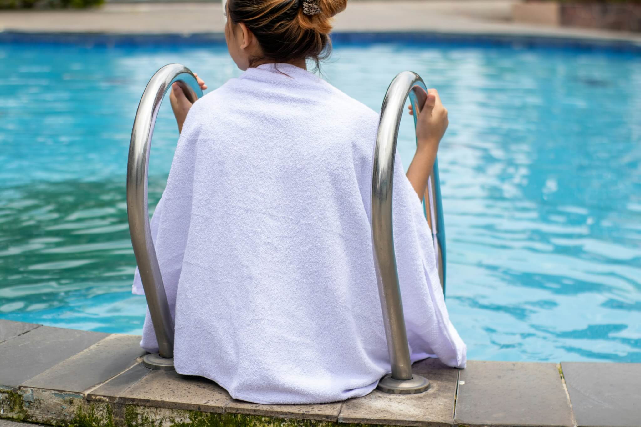 woman by the pool