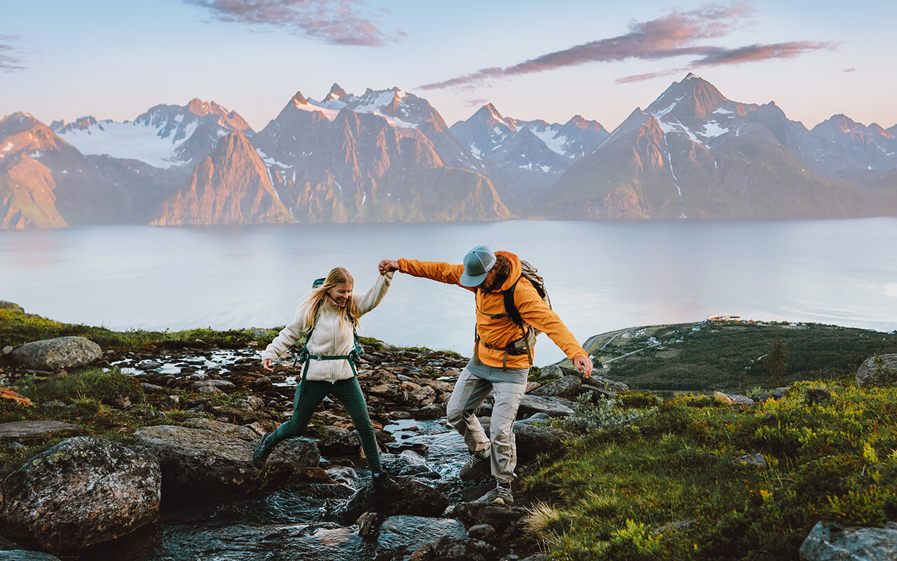 Couple hiking on a mountain path