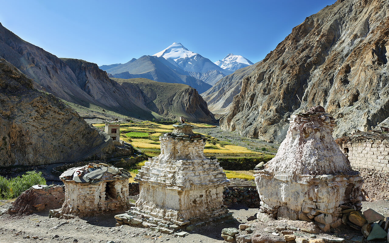 Green valley along Markha valley trek with Kang Yatse peak at background, Ladakh, India