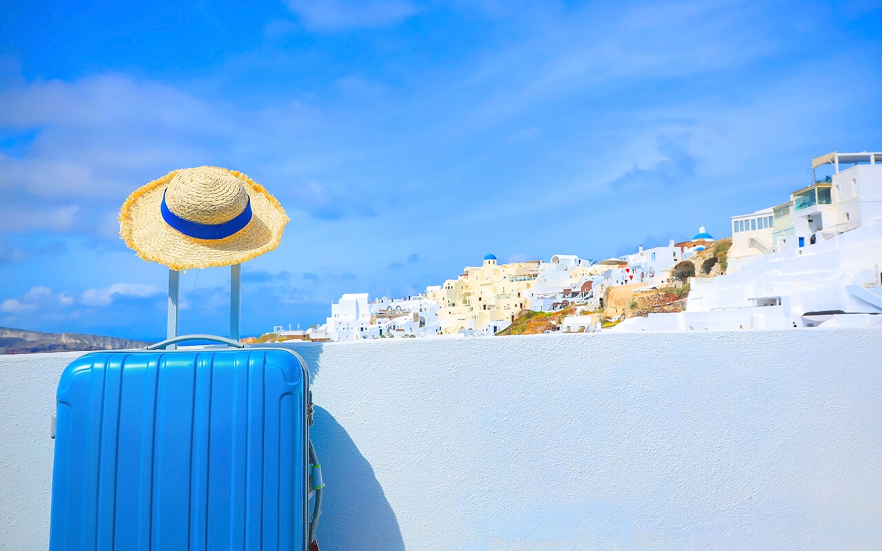 Hat on a suitcase in Greece