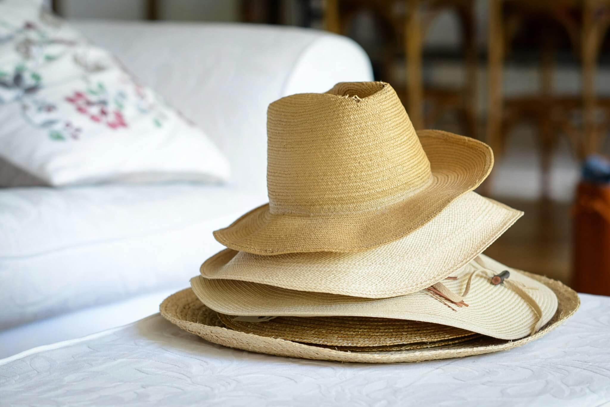 Hats on a bed