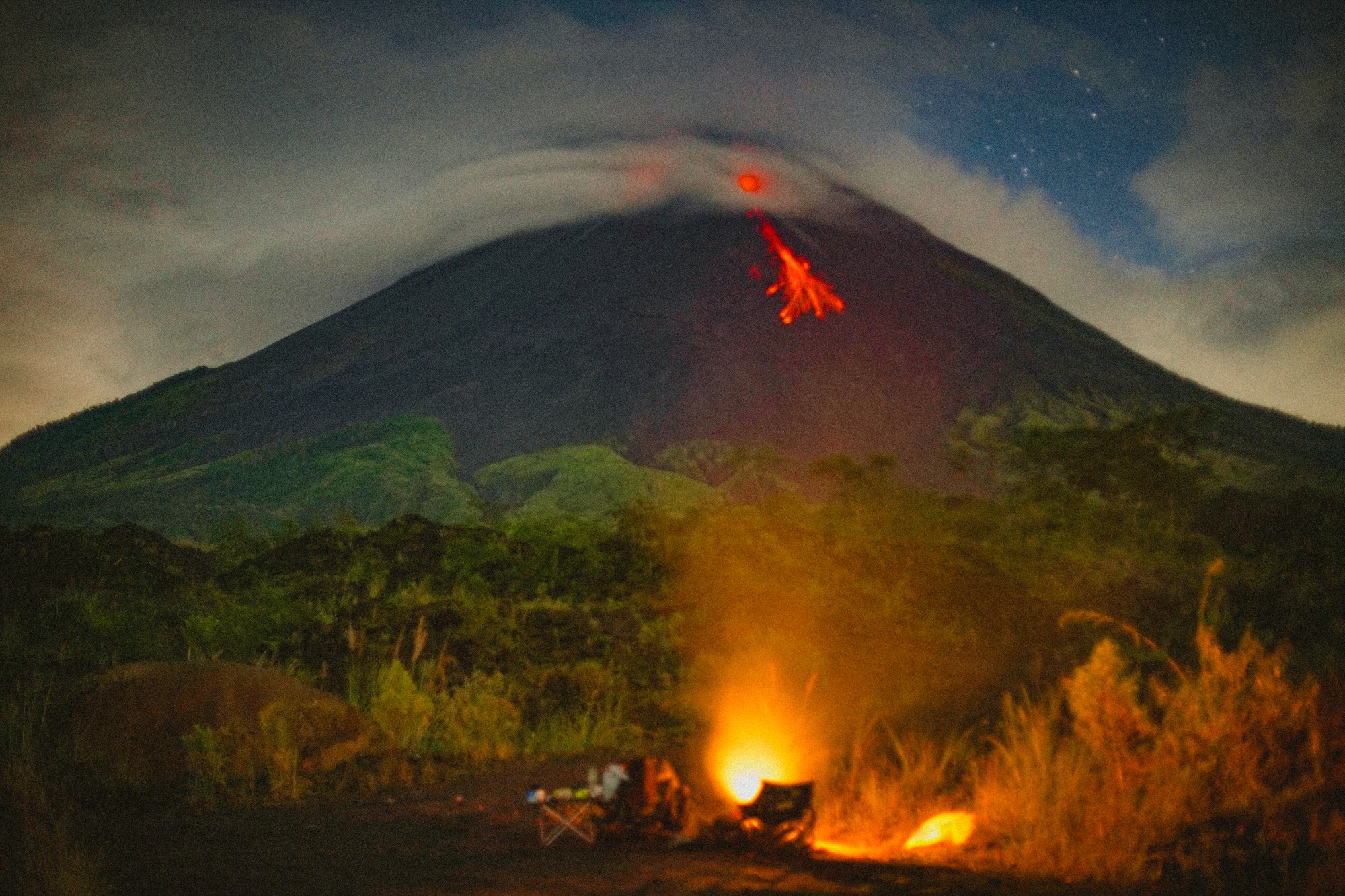 Lava flow and campfire at the campsite at Merapi