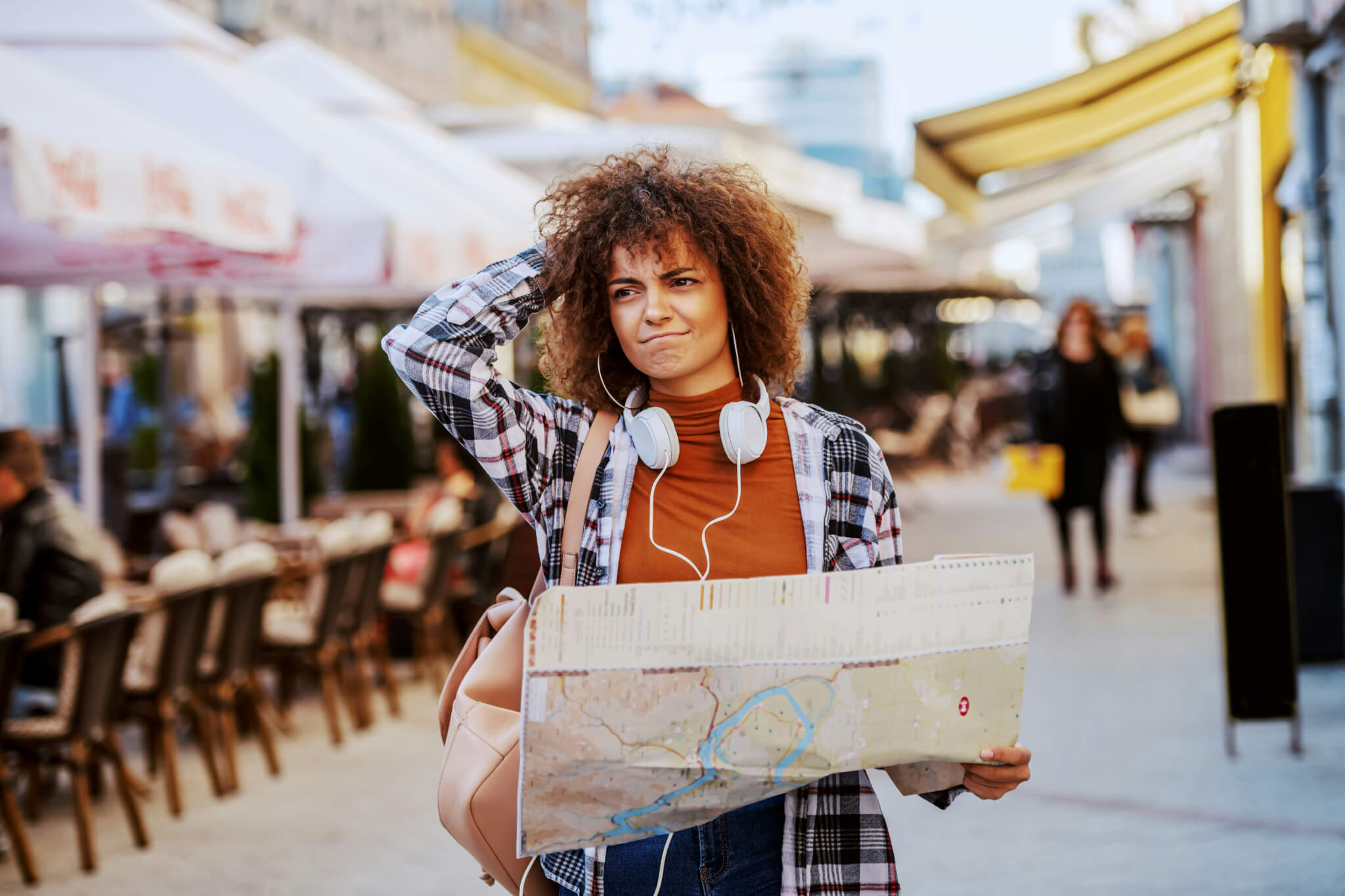 Woman traveling with a map