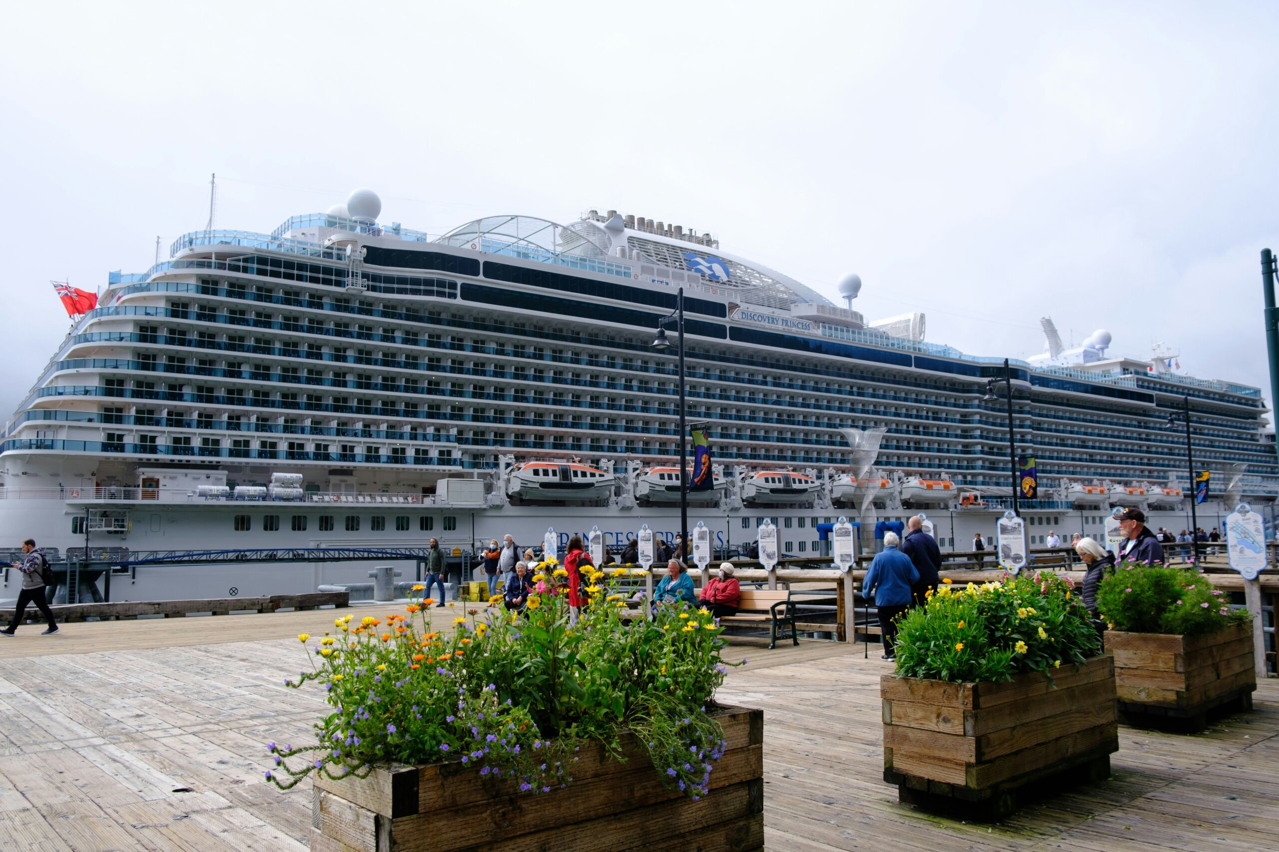 people walking near a cruise ship
