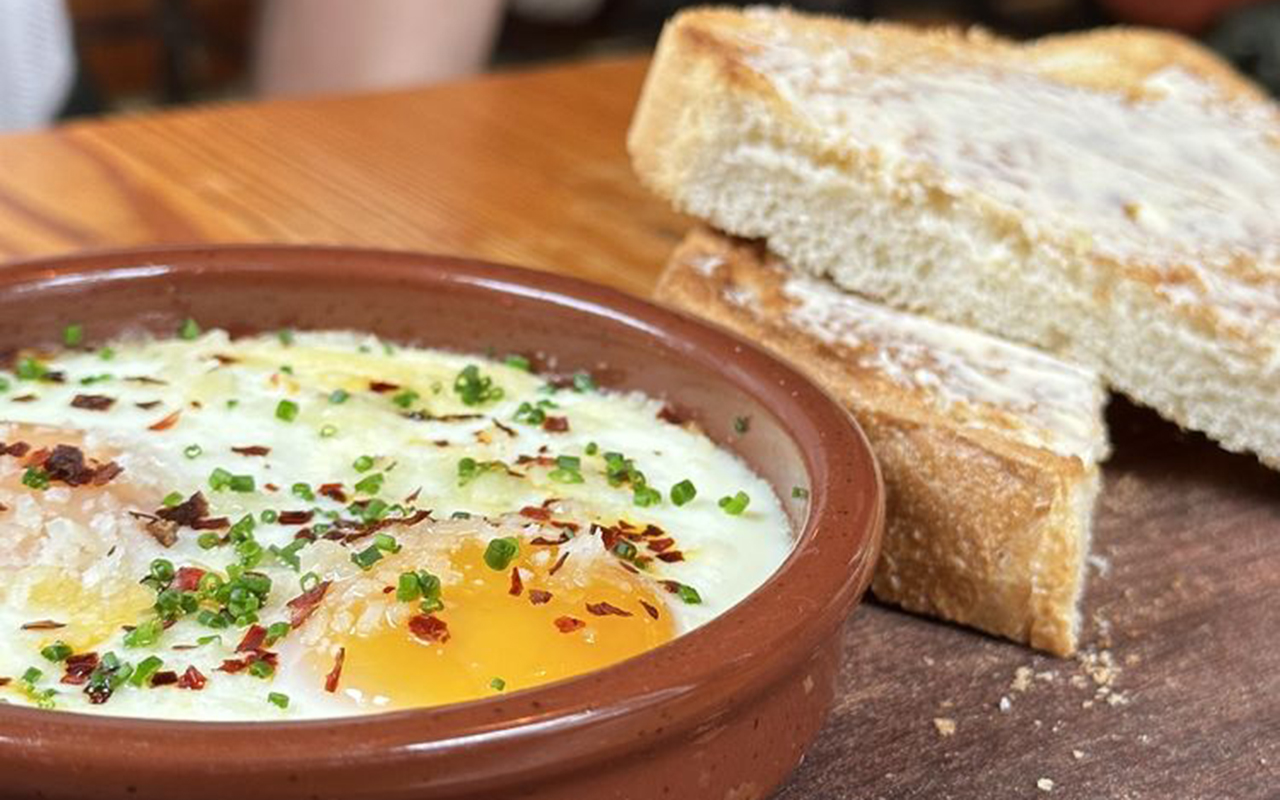 Truffle shirred egg Cream and buttered toast