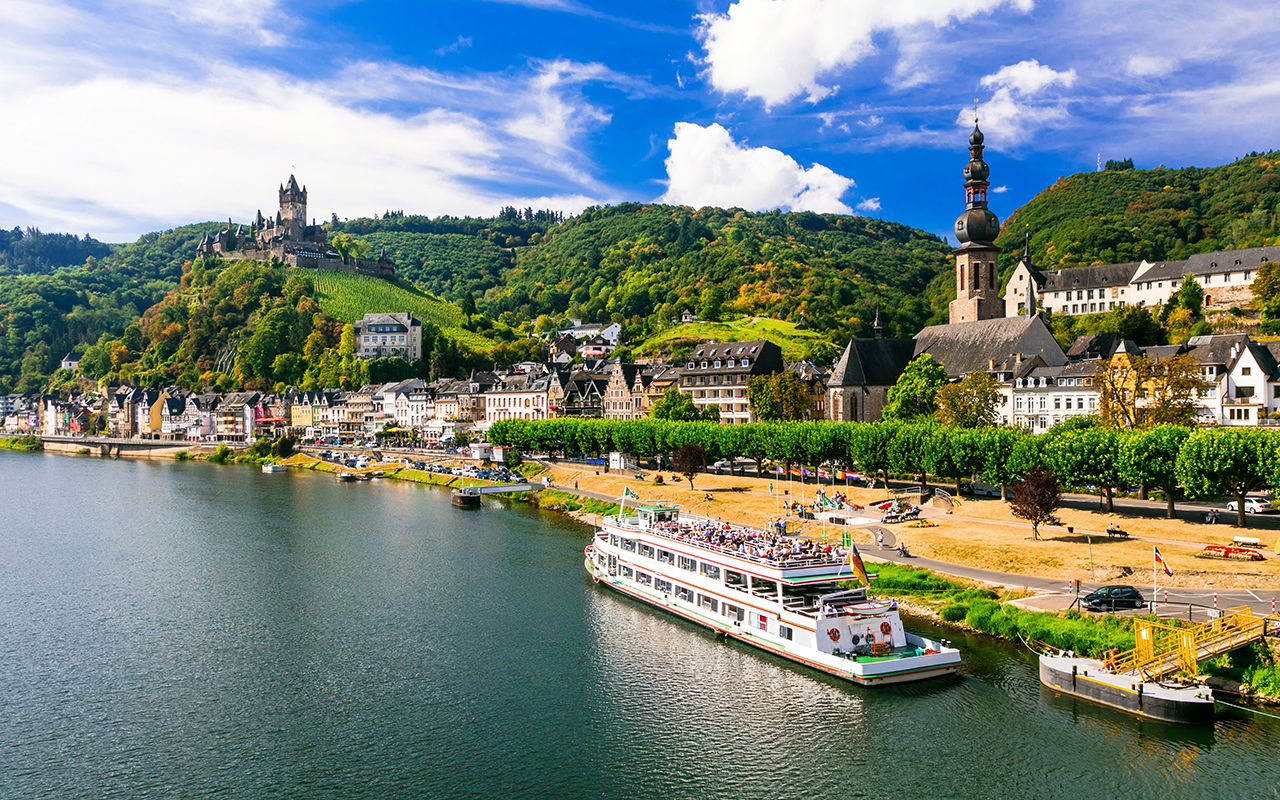 Romantic river cruises over Rhein - medieval Cochem town. Germany
