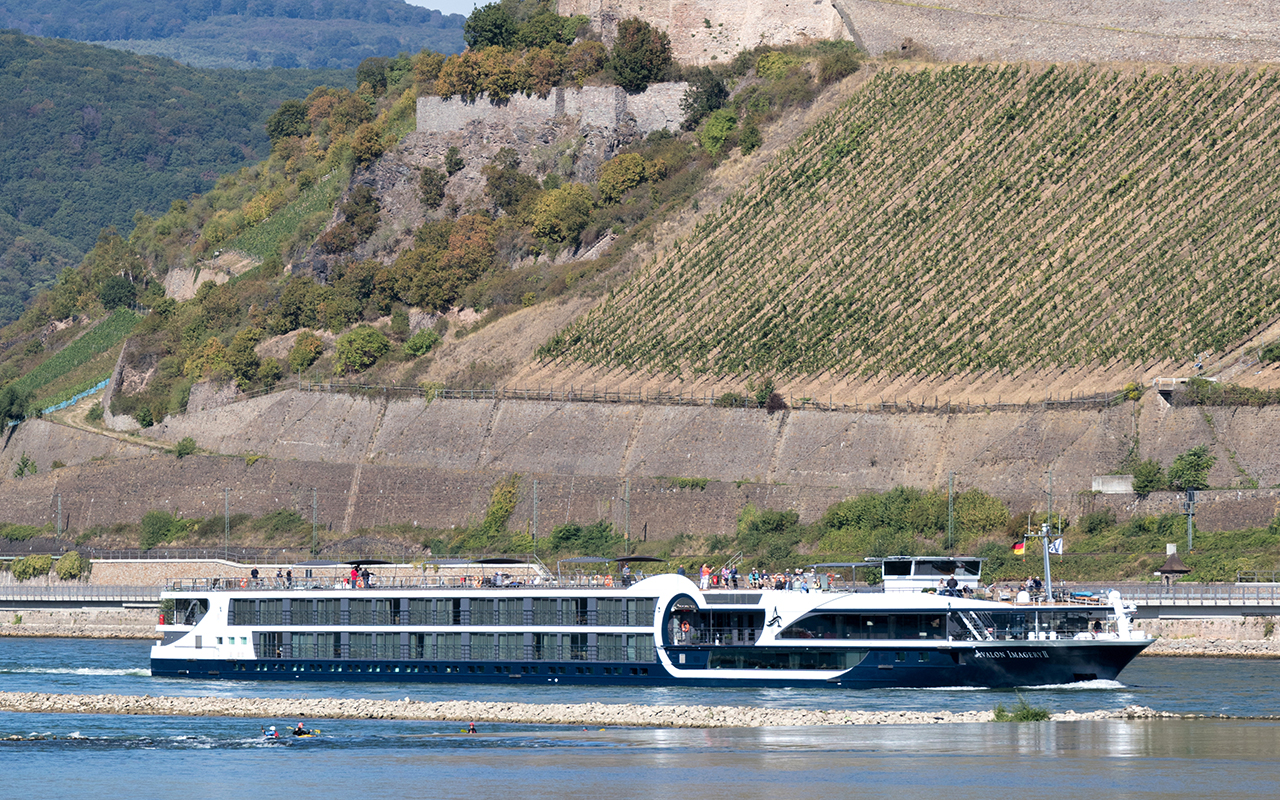 River cruise ship Avalon Imagery II passing Ehrenfels Castle. 