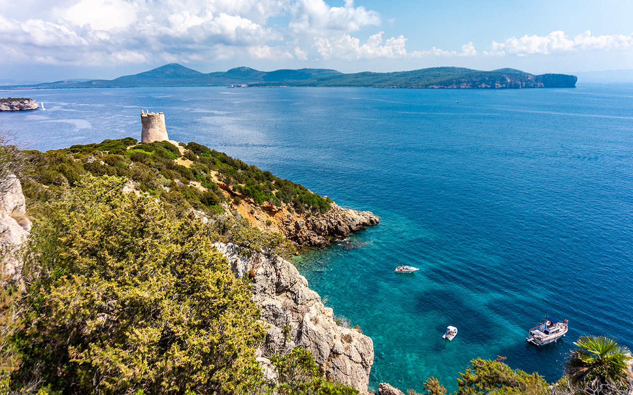 View on Torre del Bollo in Regional Natural Park Porto Conte (Sardinia, Italy, popular travel destination in Europe)