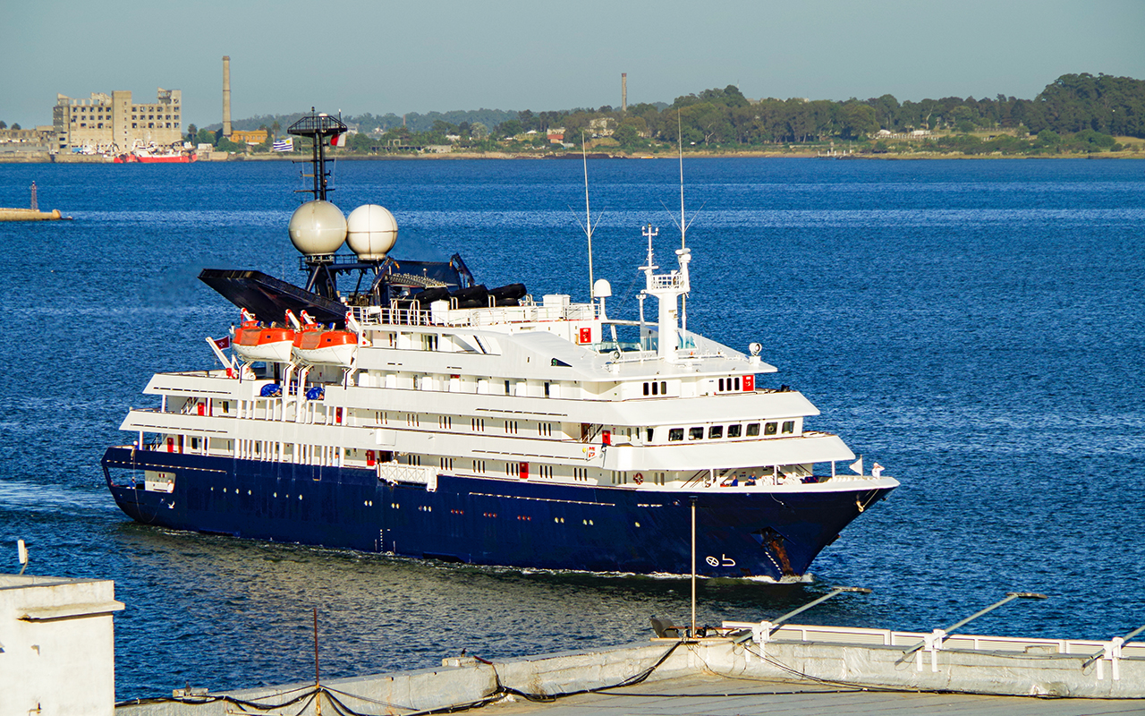 Small expedition cruiseship or cruise ship liner vessel MV Corinthian arrival into port of Montevideo, Uruguay