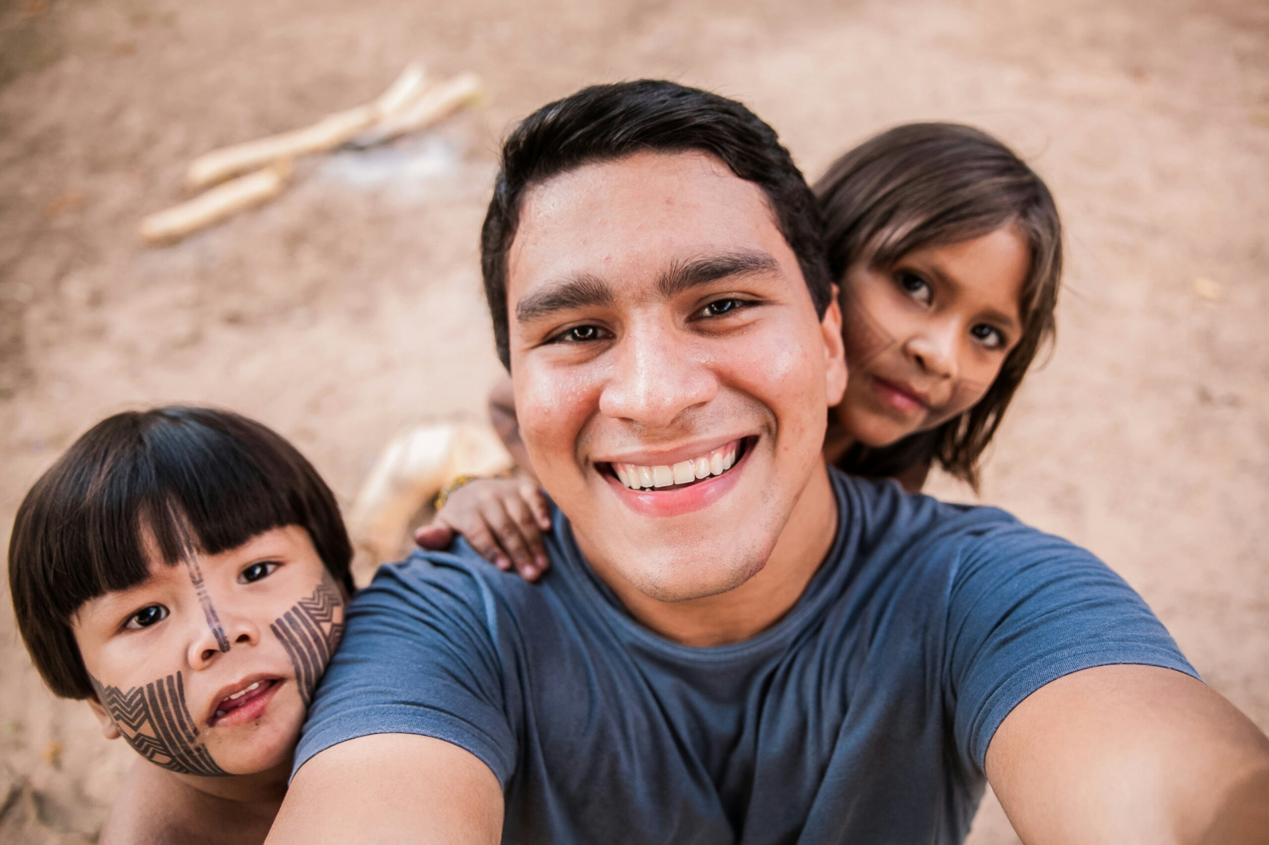 Volunteer with two children