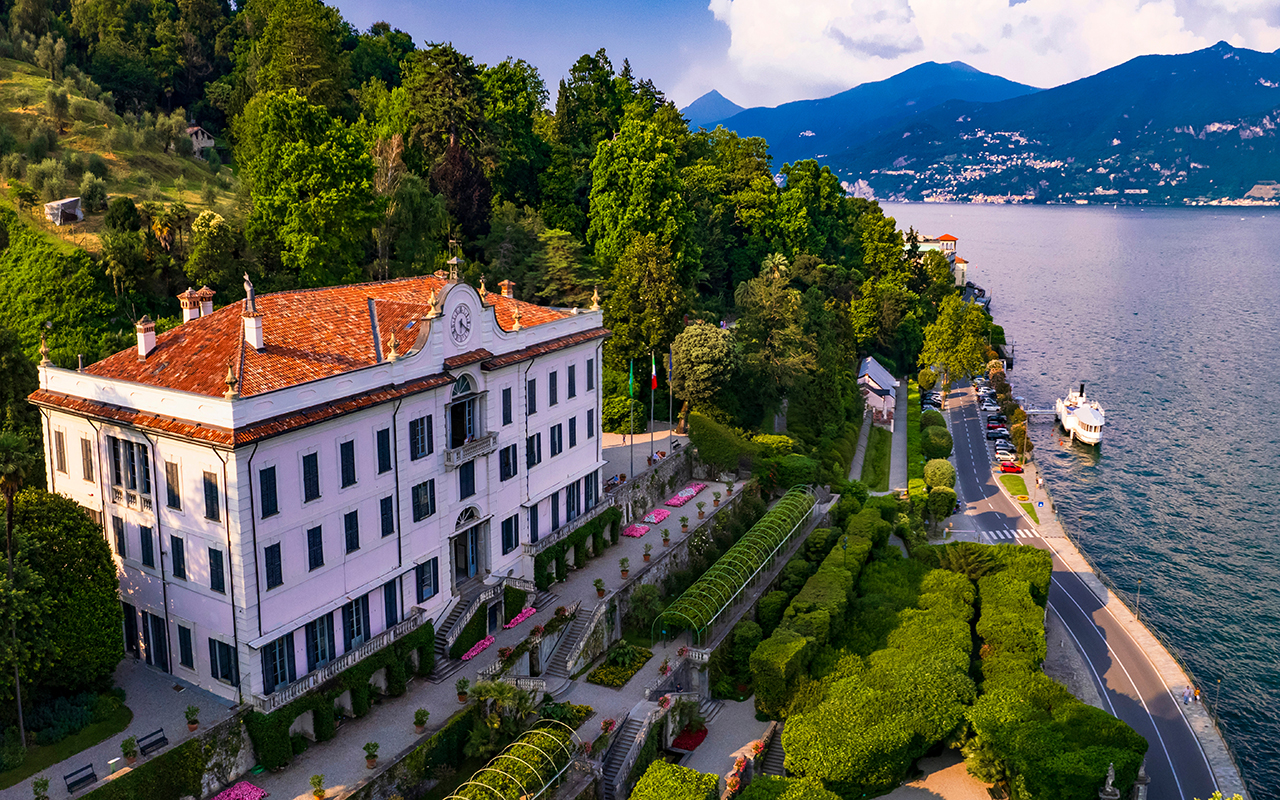 Panoramic drone high angle view of scenic Tremezzina village and villa Carlotta
