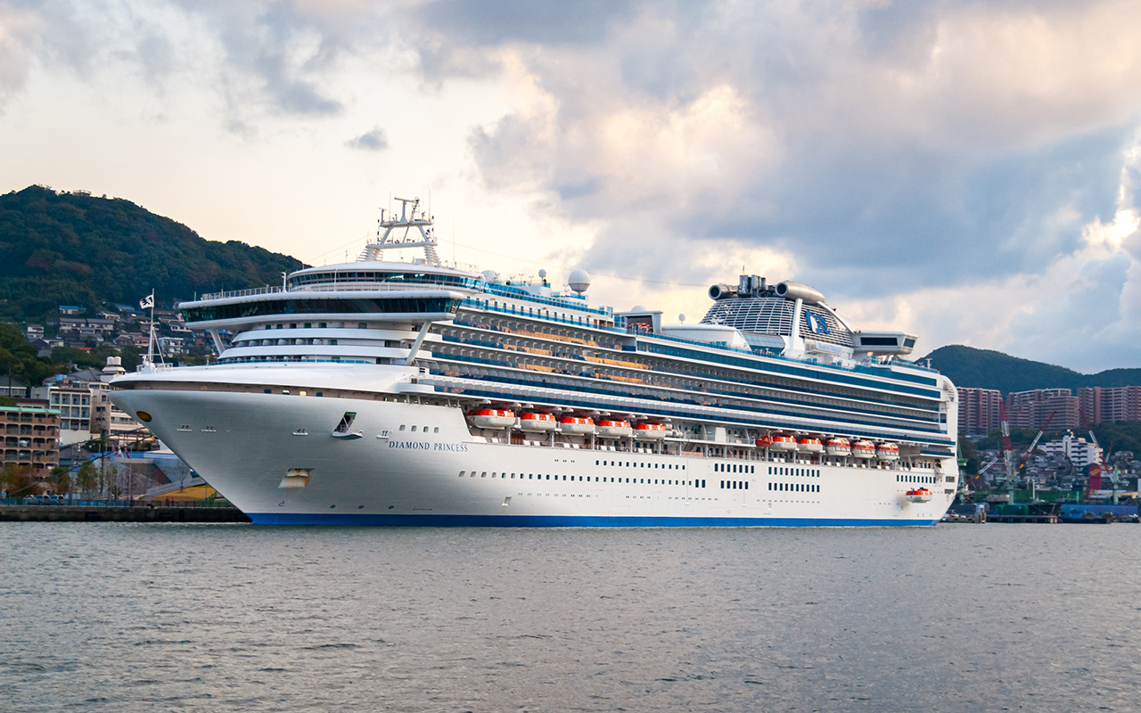 Nagasaki, Japan - November 16, 2010: Passenger cruise ship 'Diamond Princess' docked in the port of Nagasaki in Japan at sunset
