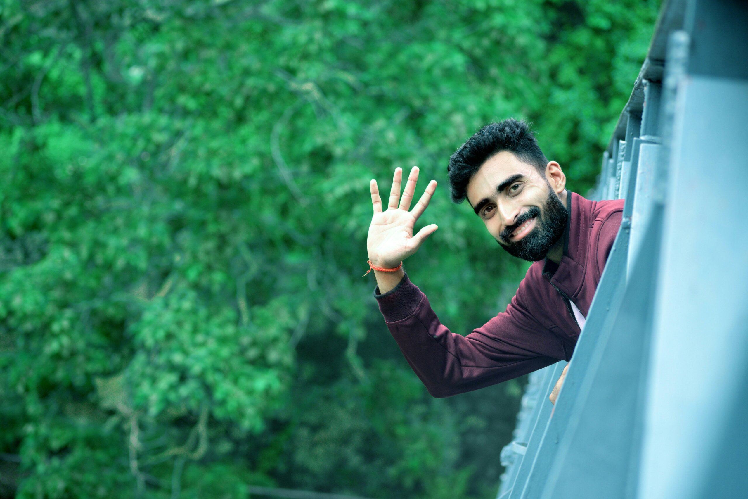 man waving hello