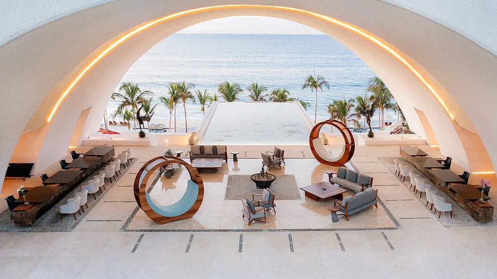 Our elegant lobby at this oceanfront all-inclusive, adults-only resort in Los Cabos 