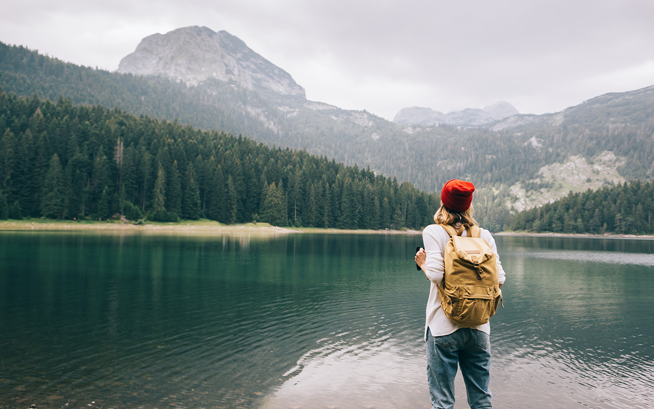 Woman looking at a lake