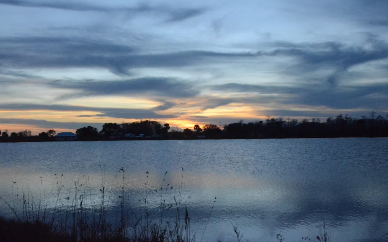 Sun sets over a freshwater lake in Everglades National Park.