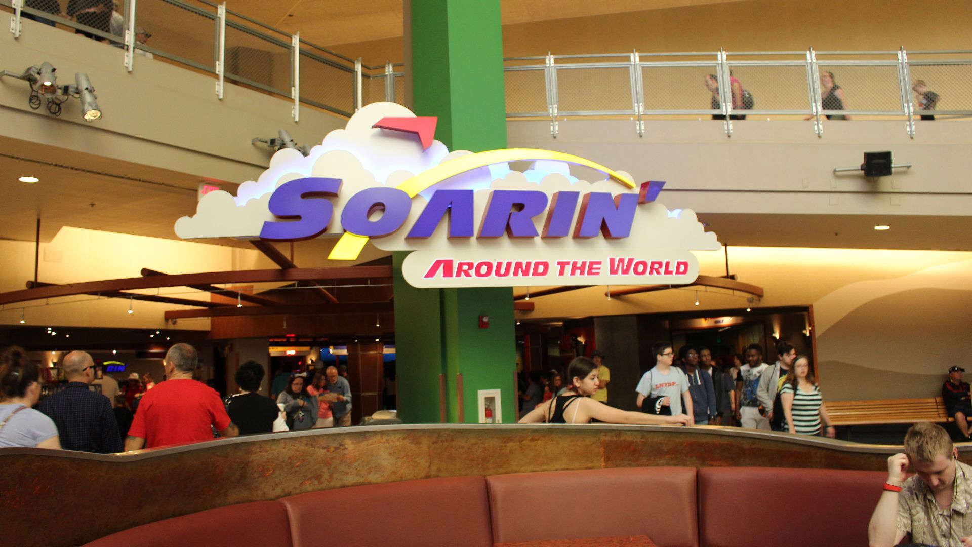 Indoor view of the 'Soarin’ Around the World' sign.