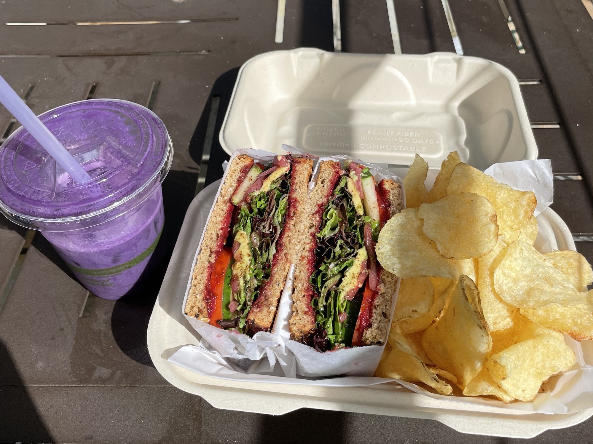 Ube latte, sandwich and chips
