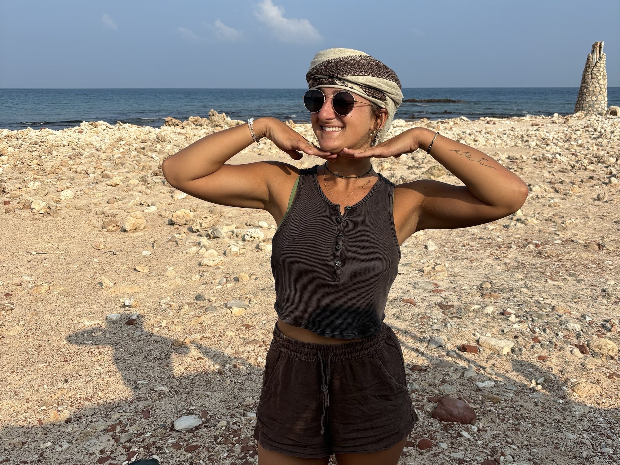 Olivia traveling on a beach
