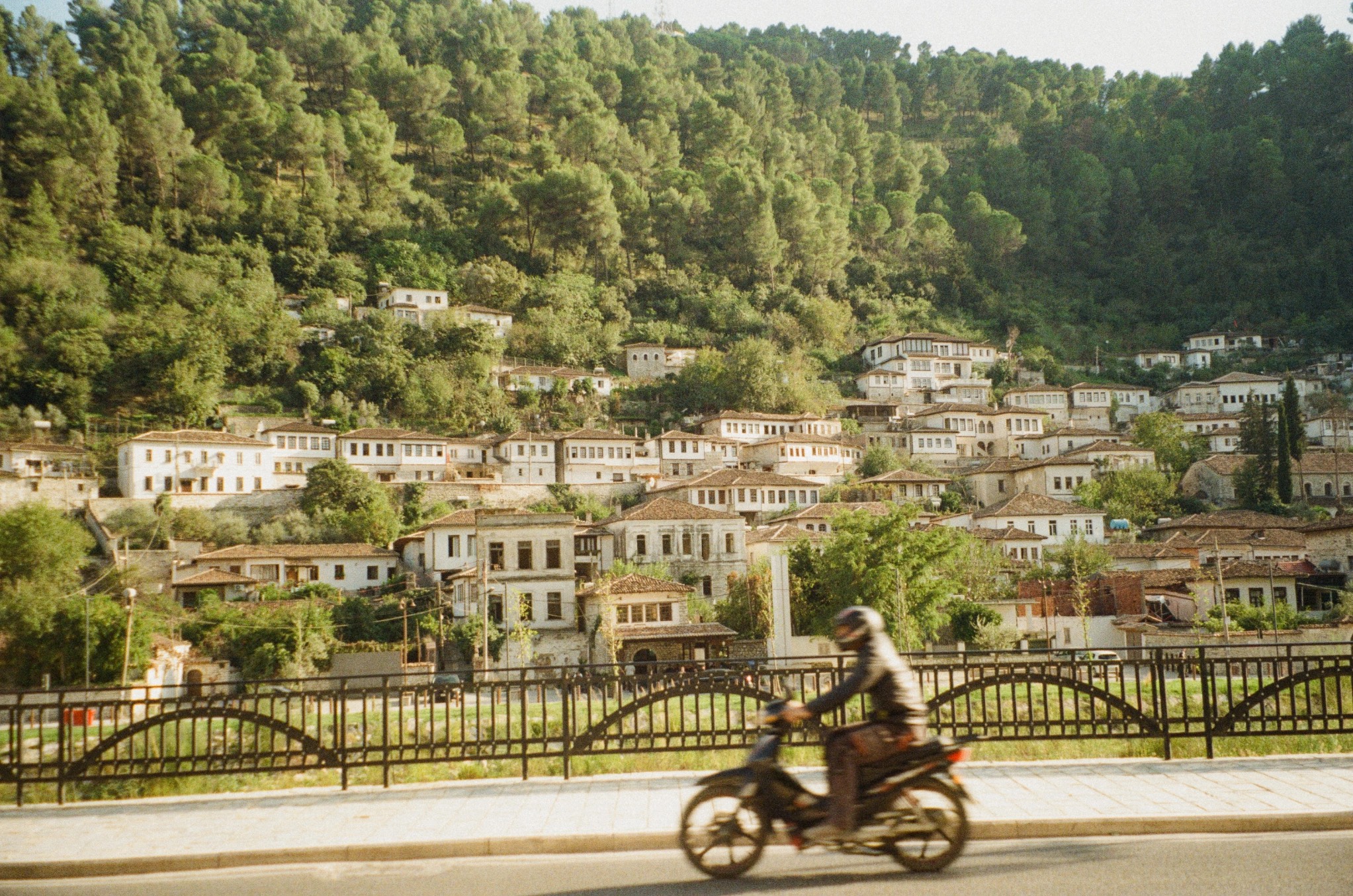 A local Albanian riding through the charming and peaceful villages of Albania.