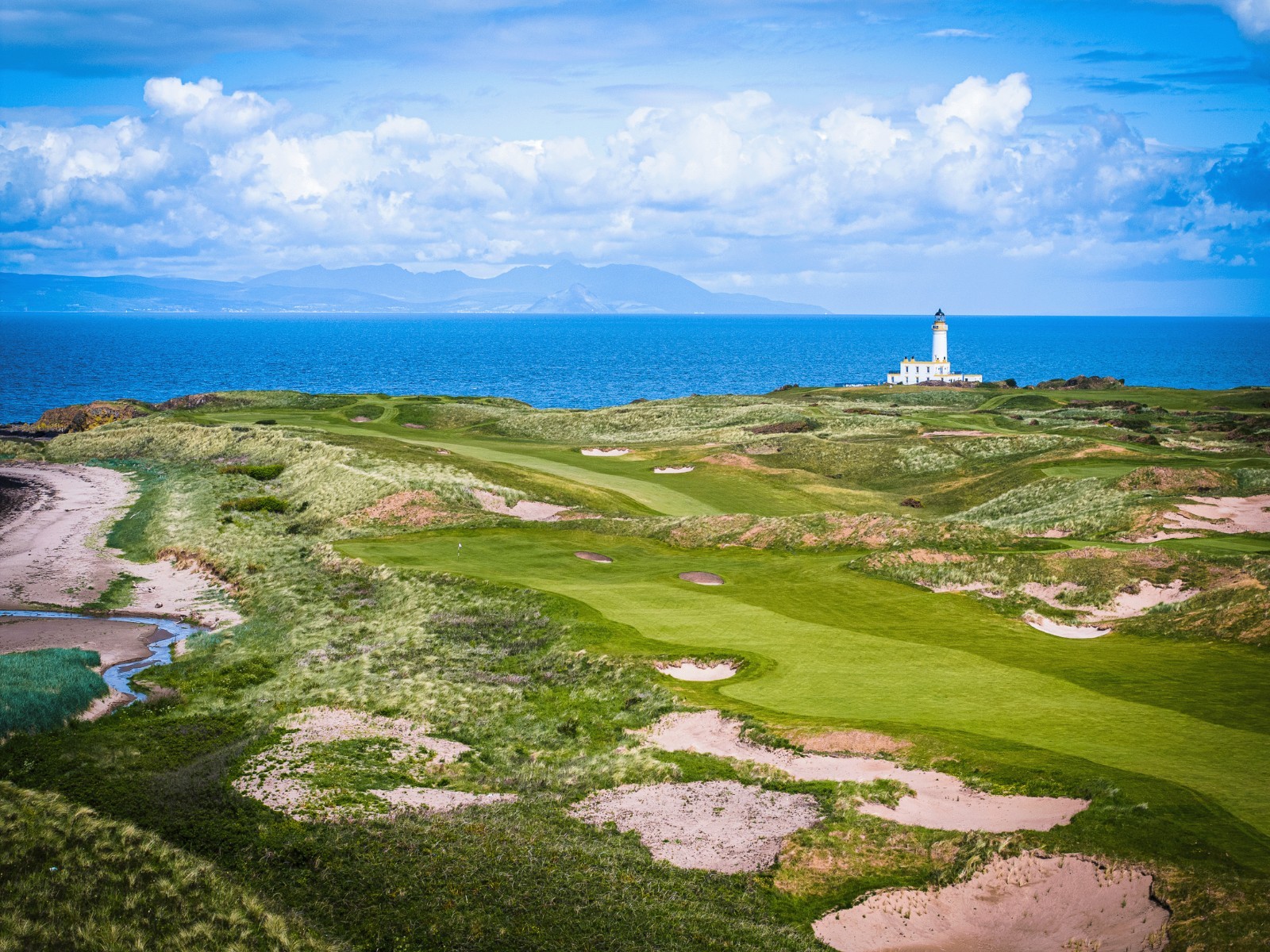 The Ailsa Course at Turnberry Scotland overlooking the ocean and lighthouse