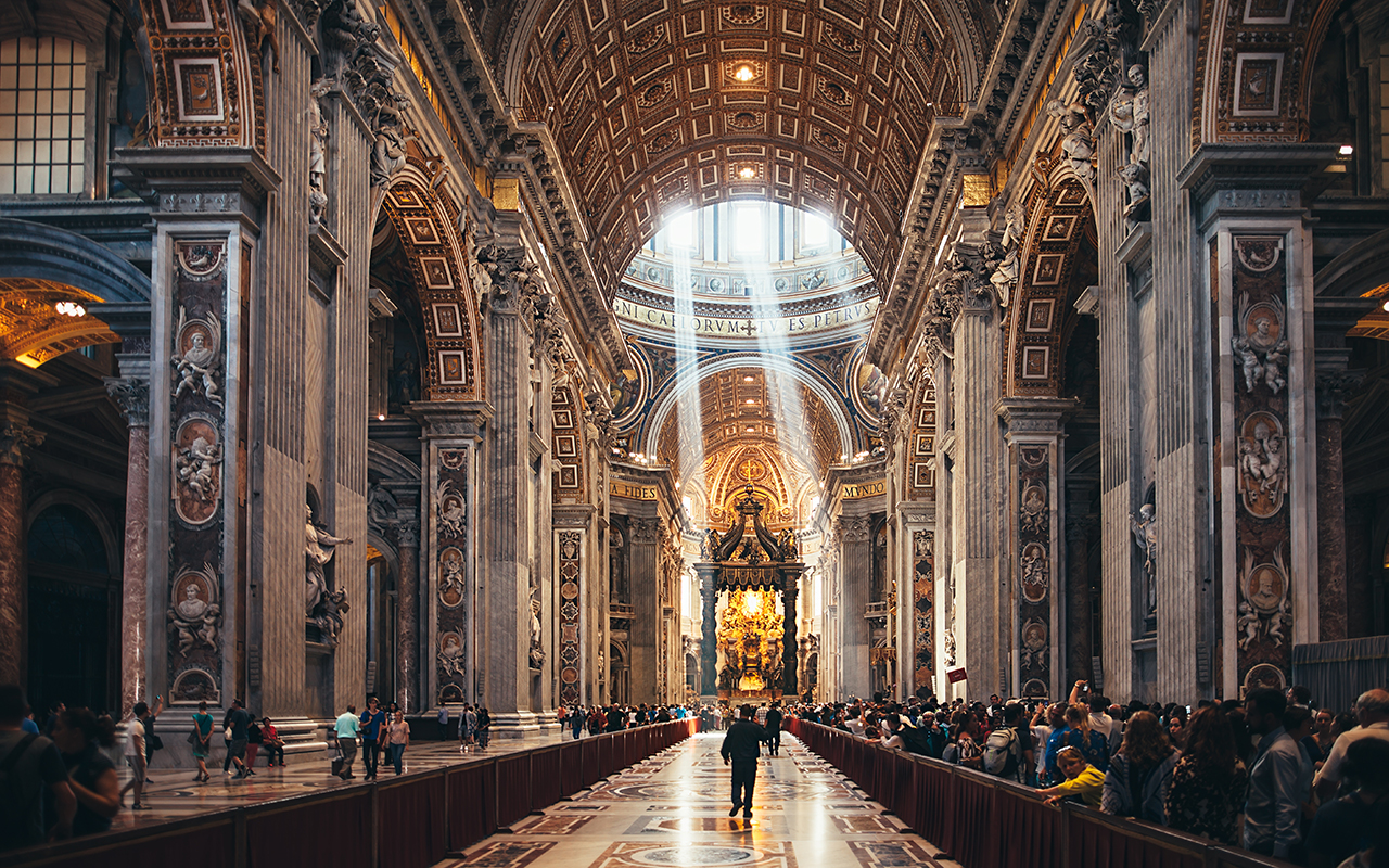 VATICAN, ROME, ITALY - JUNE 4, 2016: Interiors and architectural details of St. Peter Basilica with sun rays
