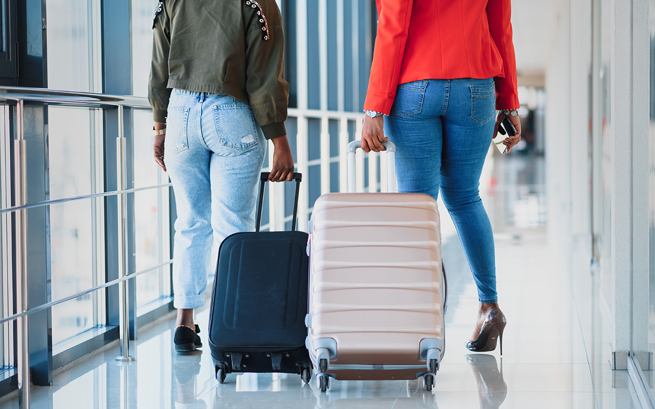 Women walking through the airport
