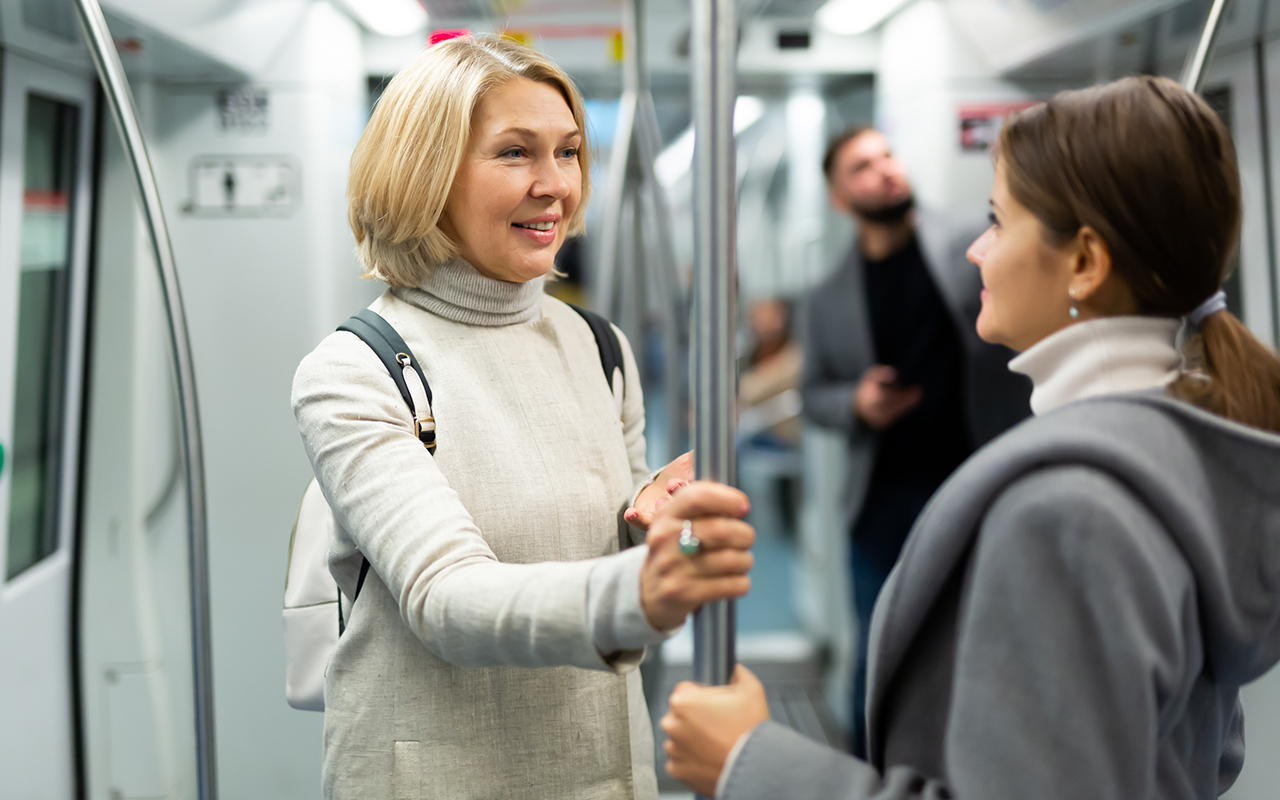 Women chatting on a train