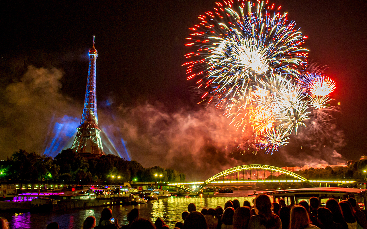 Fireworks over the Seine in Paris, France on Bastille Day.