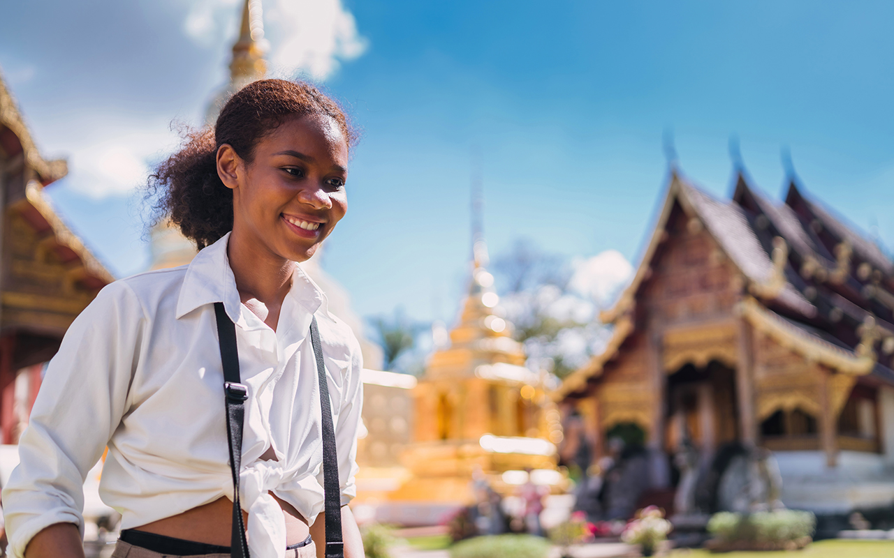 Woman at a temple in Thailand