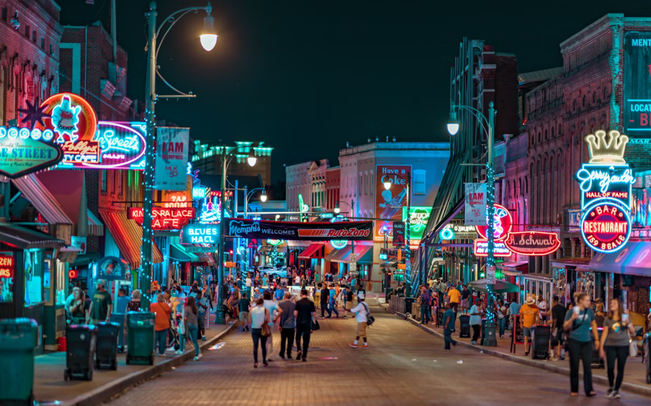 Glowing neon lights showcase Memphis, Tennessee vibrant nightlife on the lively Beale Street