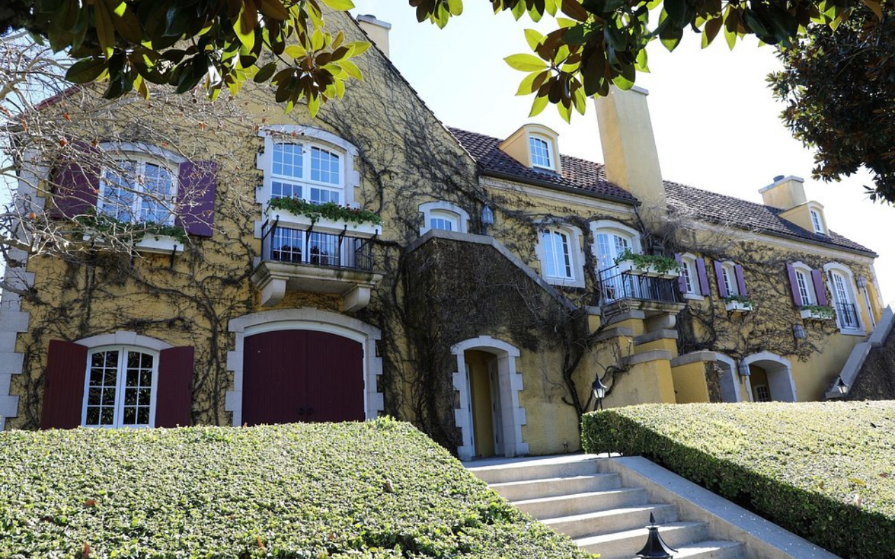 Vine climb up the walls of the Tudor style architecture of Jordan Vineyard and Winery, USA