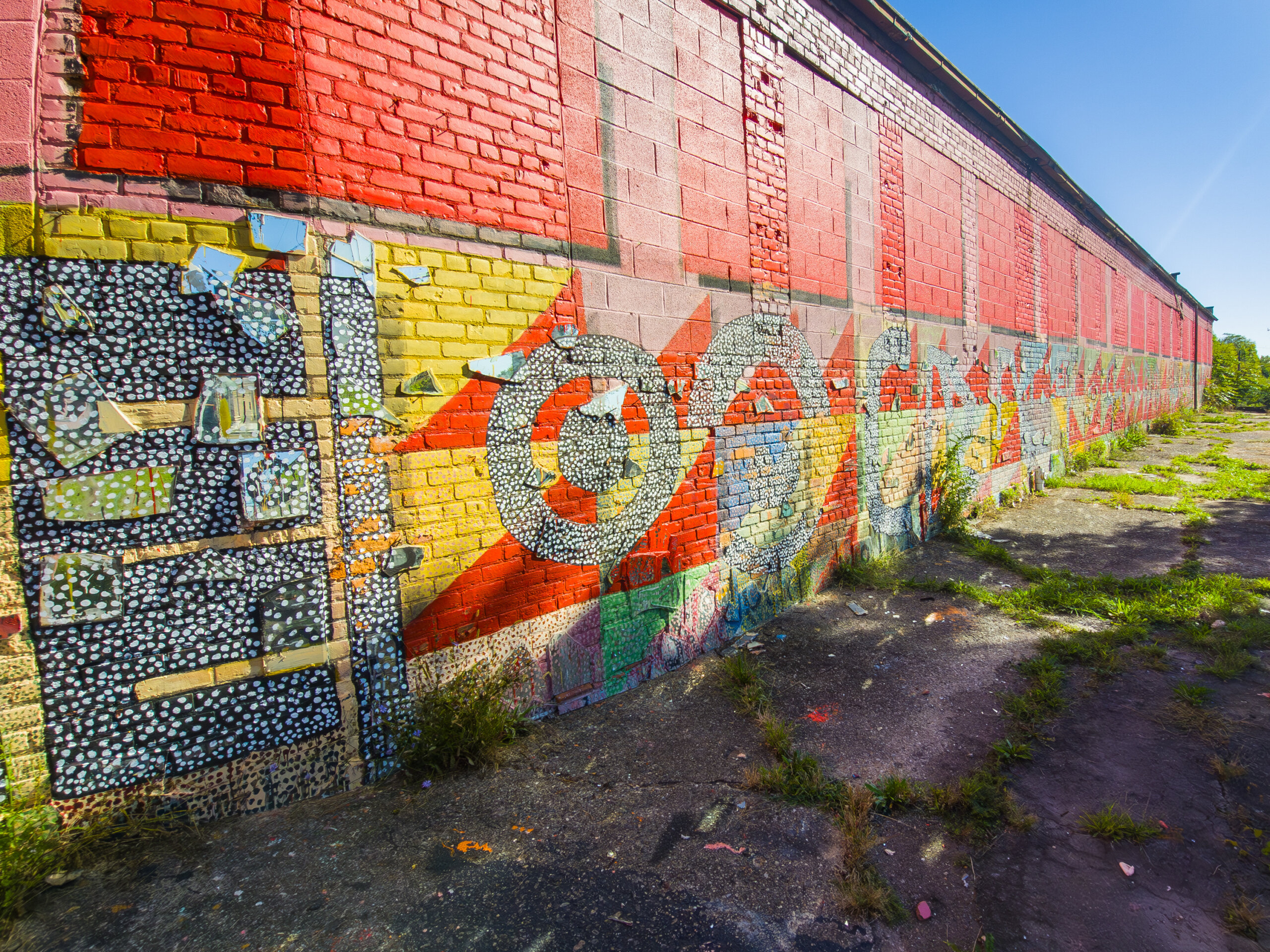 A red decorated building art project on the site of the Dabls Mbad African Bead Museum in Detroit, Michigan