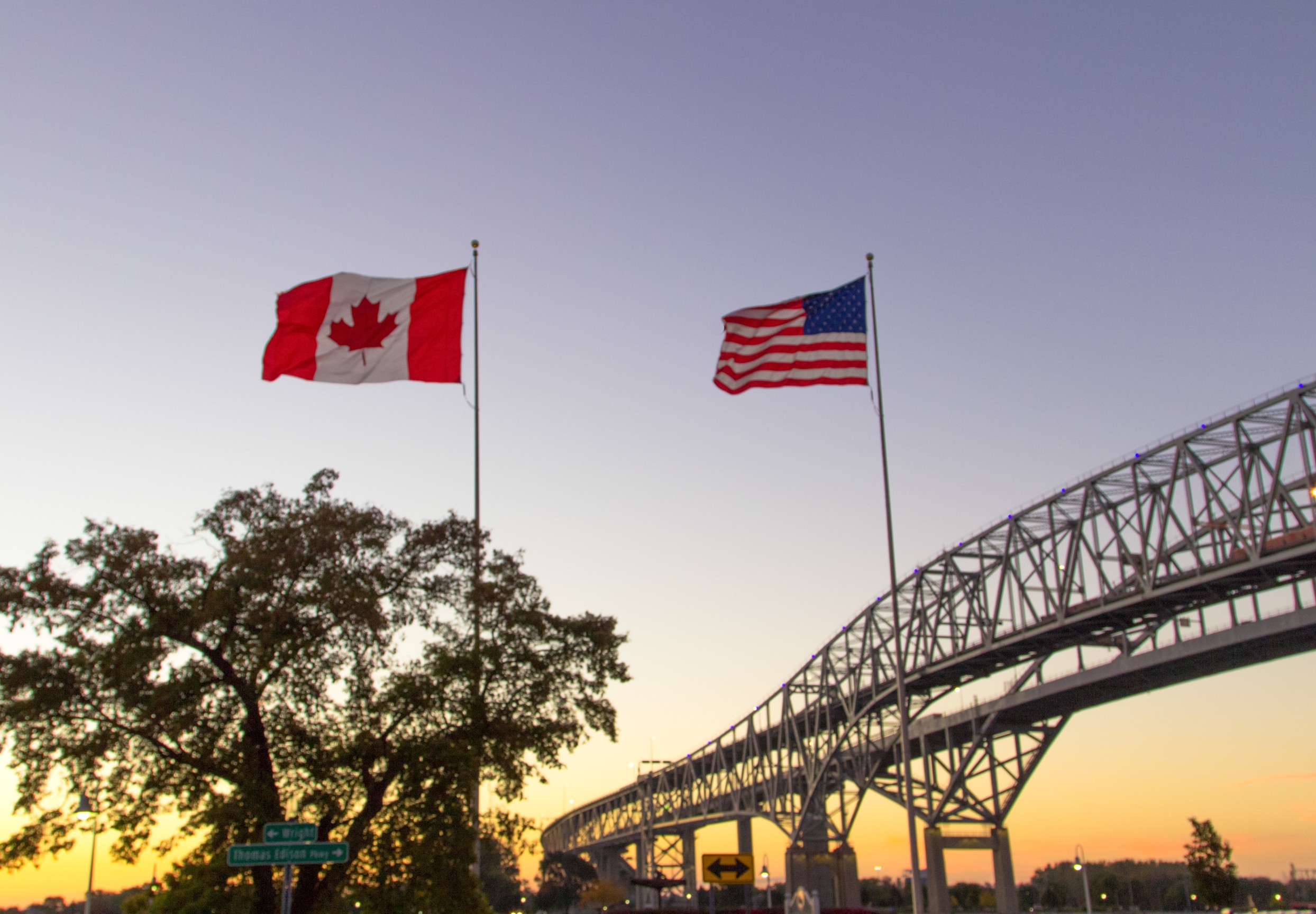 Sunset at the Blue Water Bridge border crossing between the United States and Canada, connecting Port Huron, Michigan, and Sarnia, Ontario.