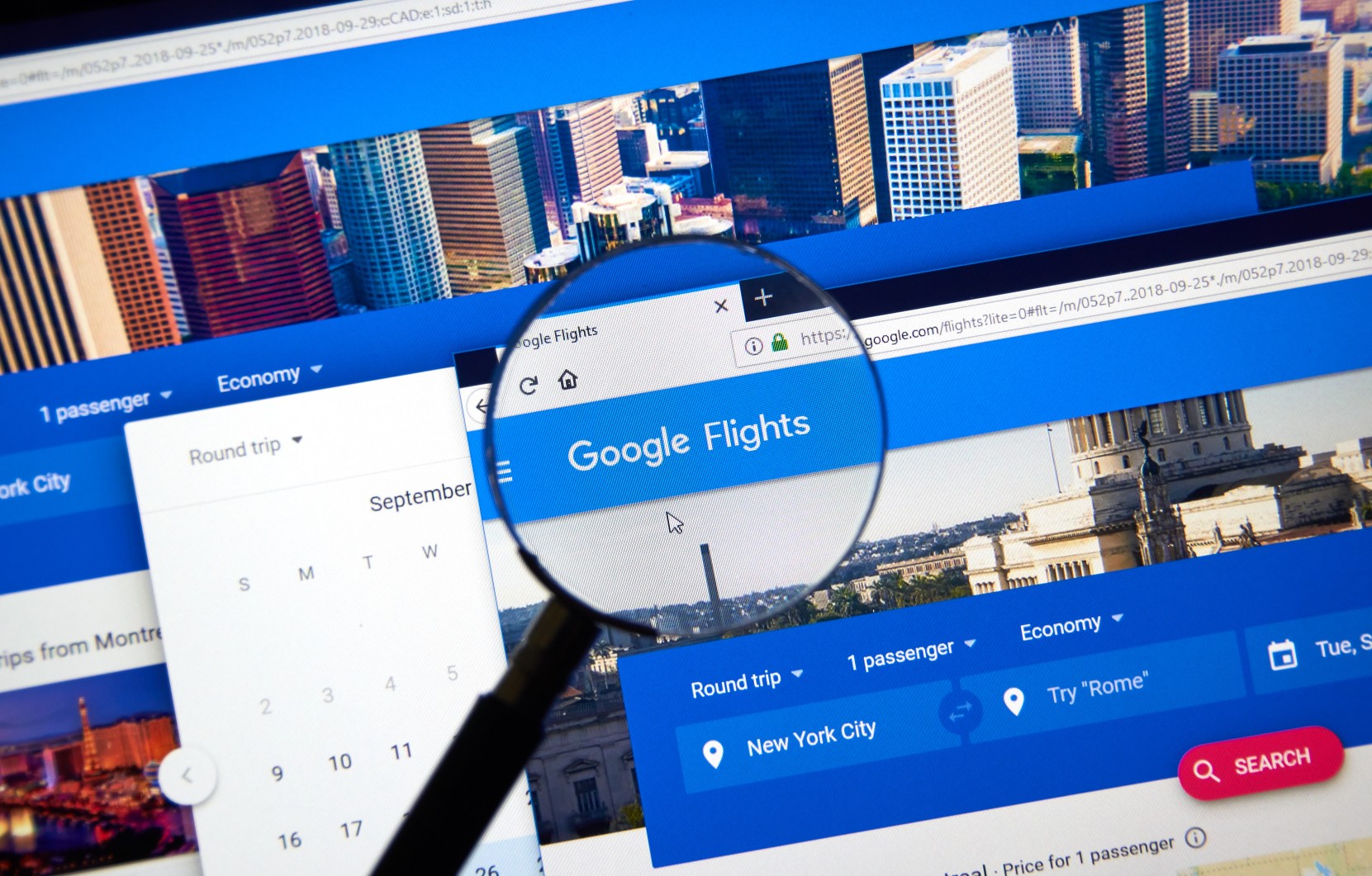 Close-up of Google Flights website with a magnifying glass highlighting the search tool, representing holiday airfare tracking and price alerts.