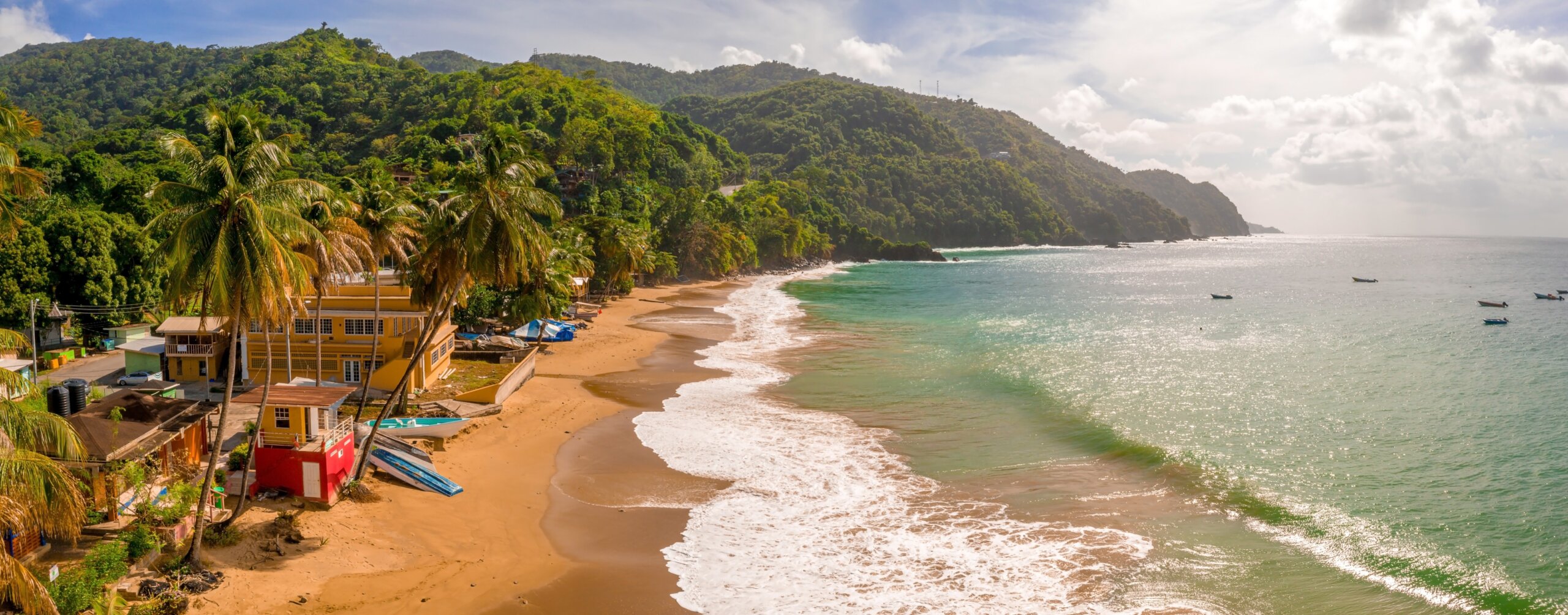 Beautiful tropical Barbados island. View of the golden beach with palms and crystal clear water. Perfect holidays background.