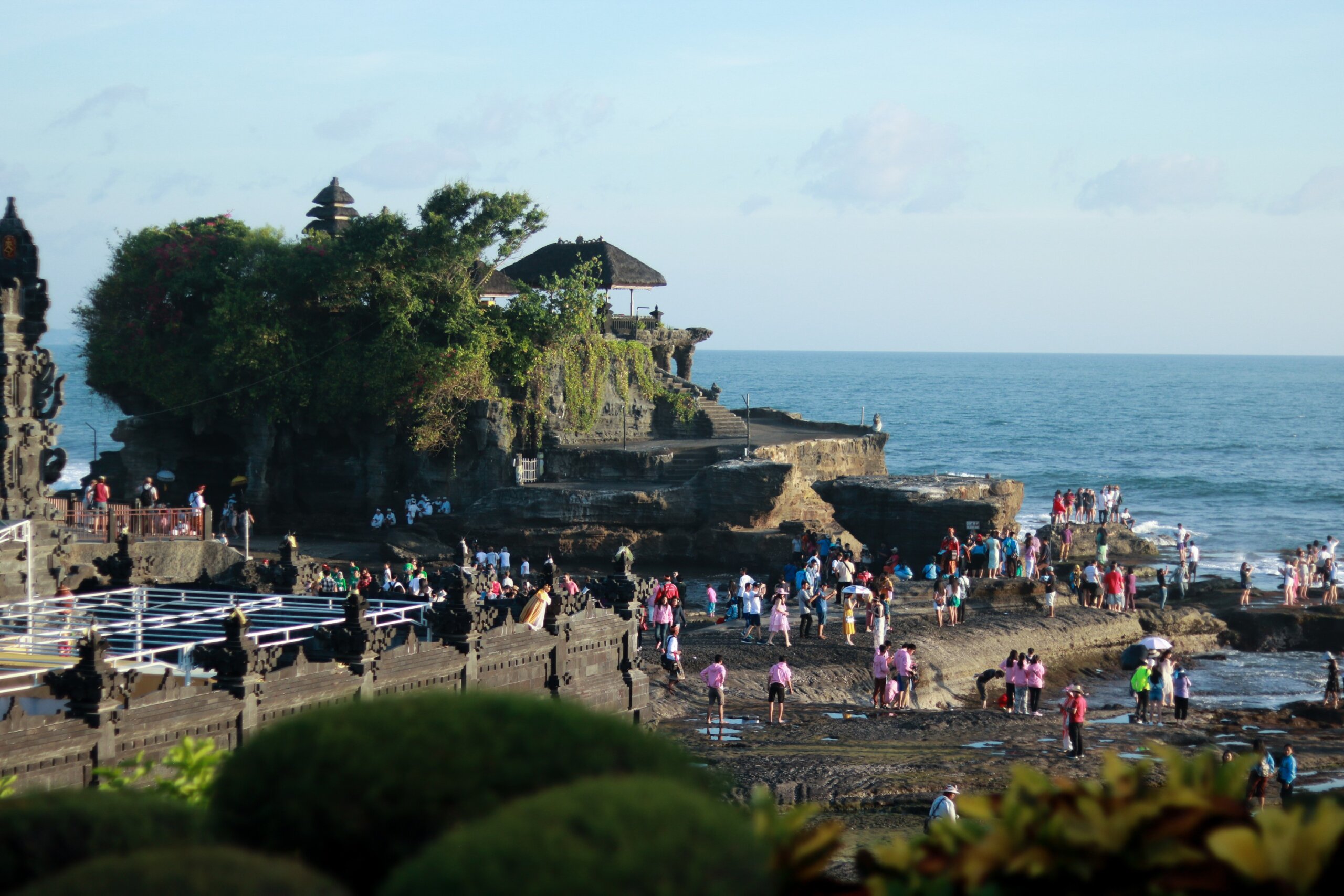 Natural temple in Bali with crowds