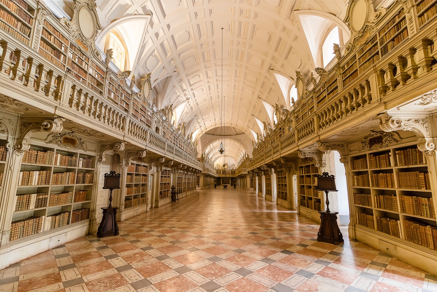 LISBON, PORTUGAL - DECEMBER 10, 2017: Library of the Mafra National Palace. Franciscan religious order. 18th Century Baroque architecture