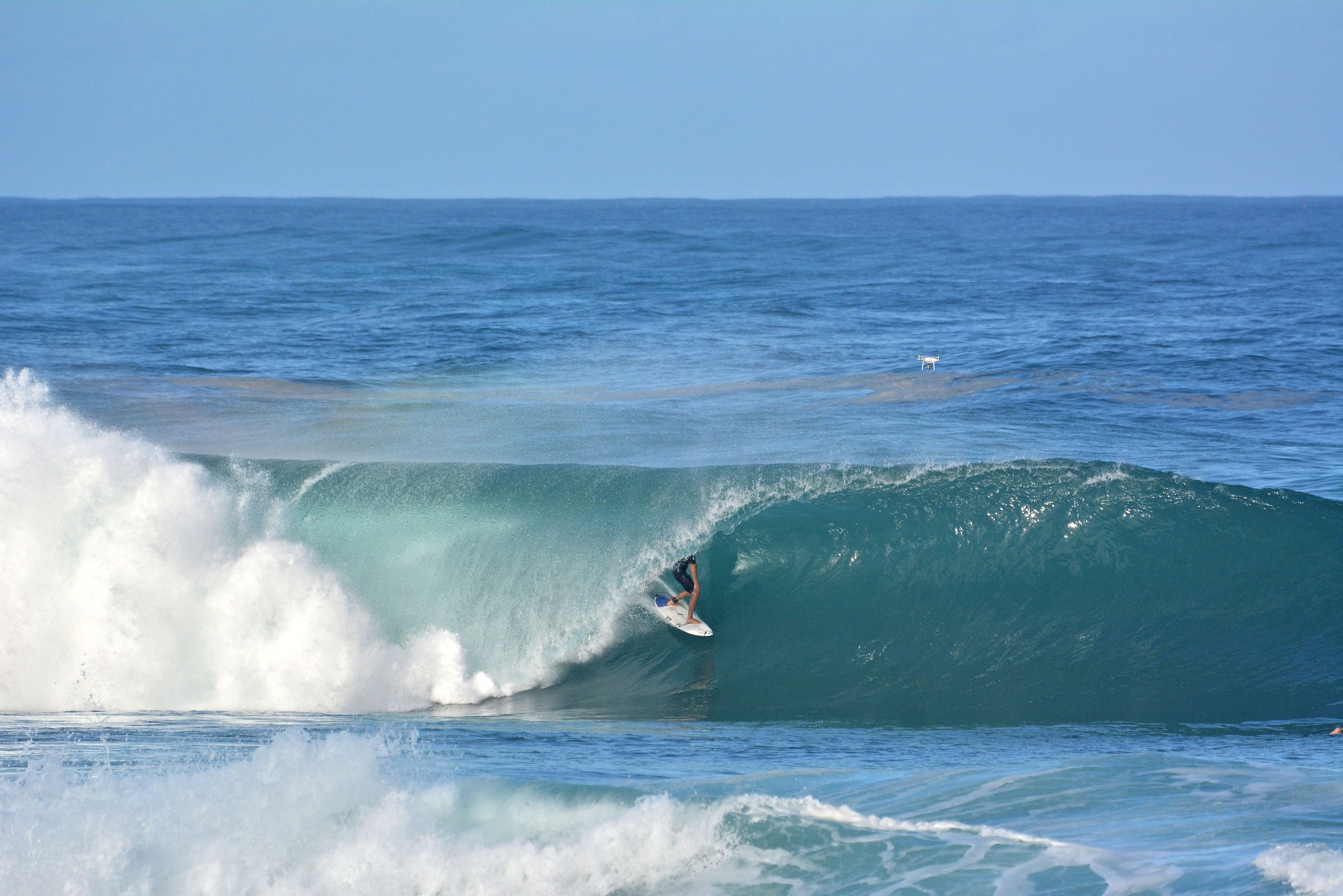 Surfing on the Northshore during large winter wave swells on Oahu, Hawaii.