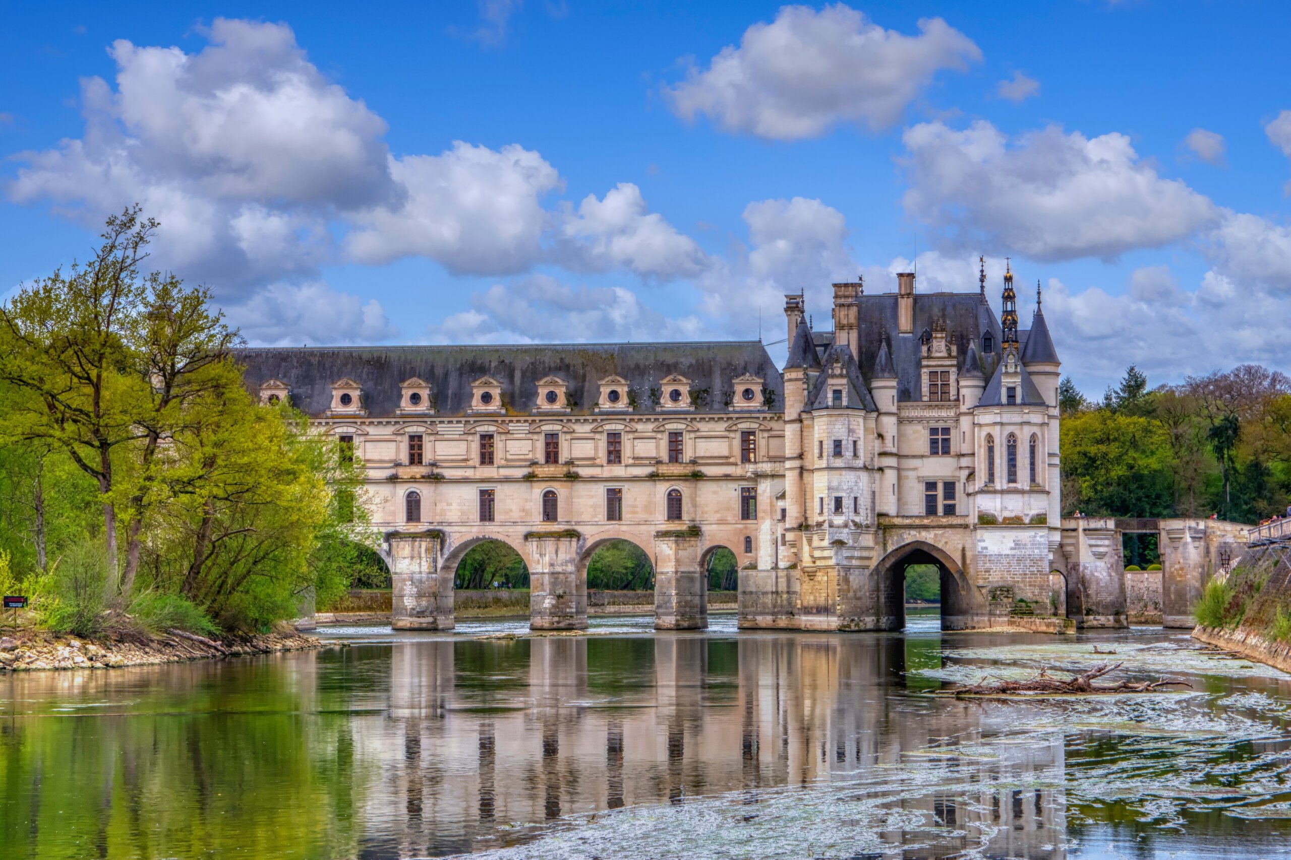 Beautiful Chateau de Chenonceau at dusk over the river Cher, Loire Valley, France.