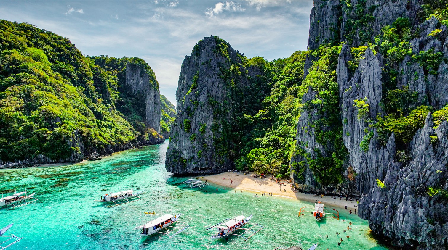 Aerial of Cliff Landscape and Turquoise Crystal-Clear Water In El Nido, Palawan, Philippines. Beautiful Vacation Travel Destination