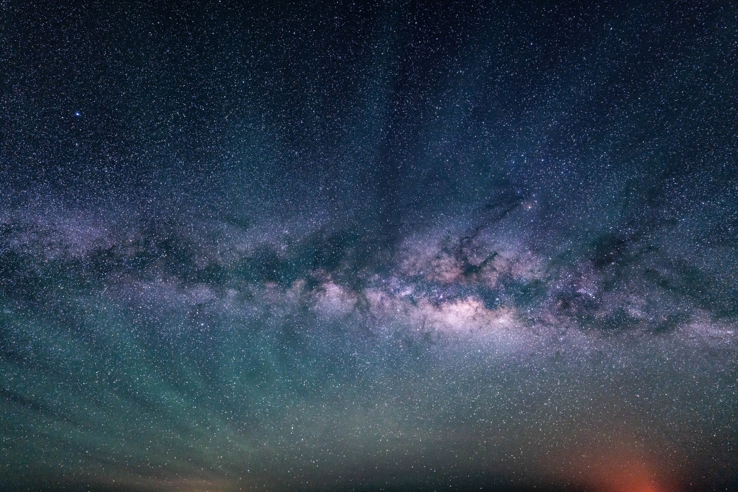 Stargazing at Mauna Kea, Big Island, Hawaii. Starry night sky, Milky Way galaxy astrophotography. Airglow (also called nightglow) is a faint emission of light by a planetary atmosphere.
