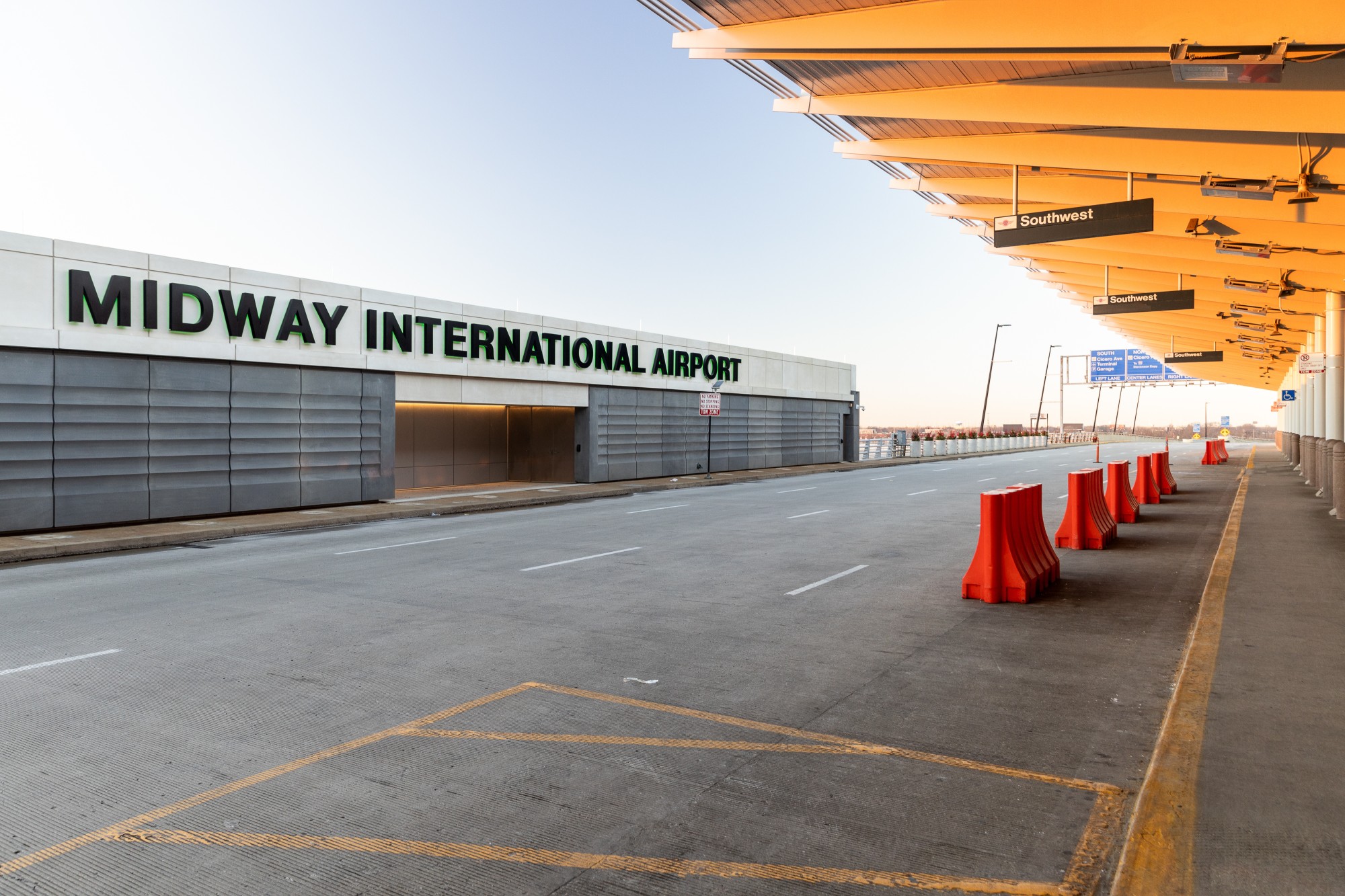 Exterior view of Chicago Midway International Airport sign, one of the worst airports for Labor Day travel