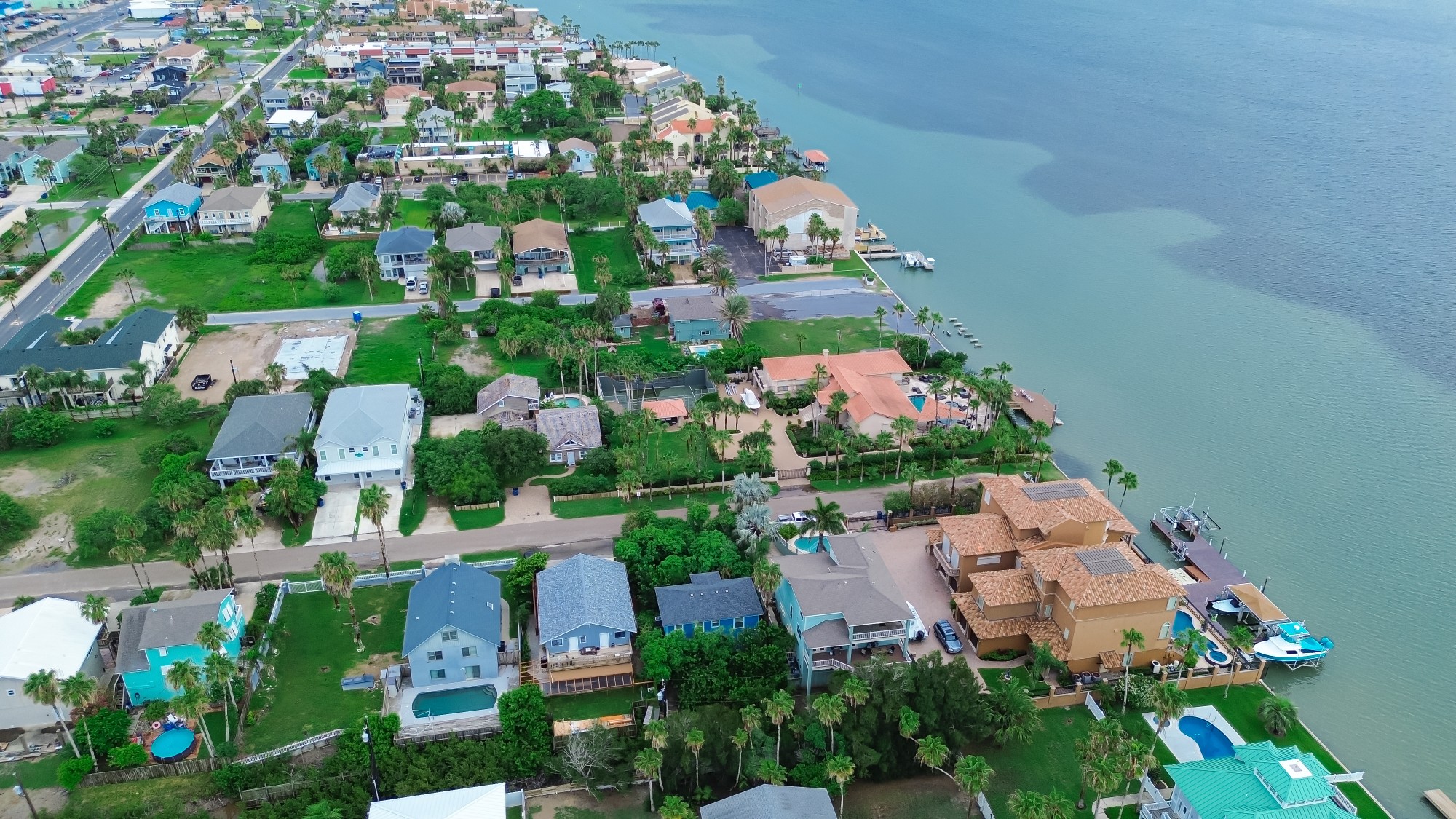 
Downloaded
 Save to Library
 Preview Crop
 Find Similar
 
File #:  930068672
Private jetty yacht beach access from luxury mansion houses, villas with swimming pool, palm trees, upscale residential neighborhood in South Padre Island, Texas Gulf Coast vacation, aerial view