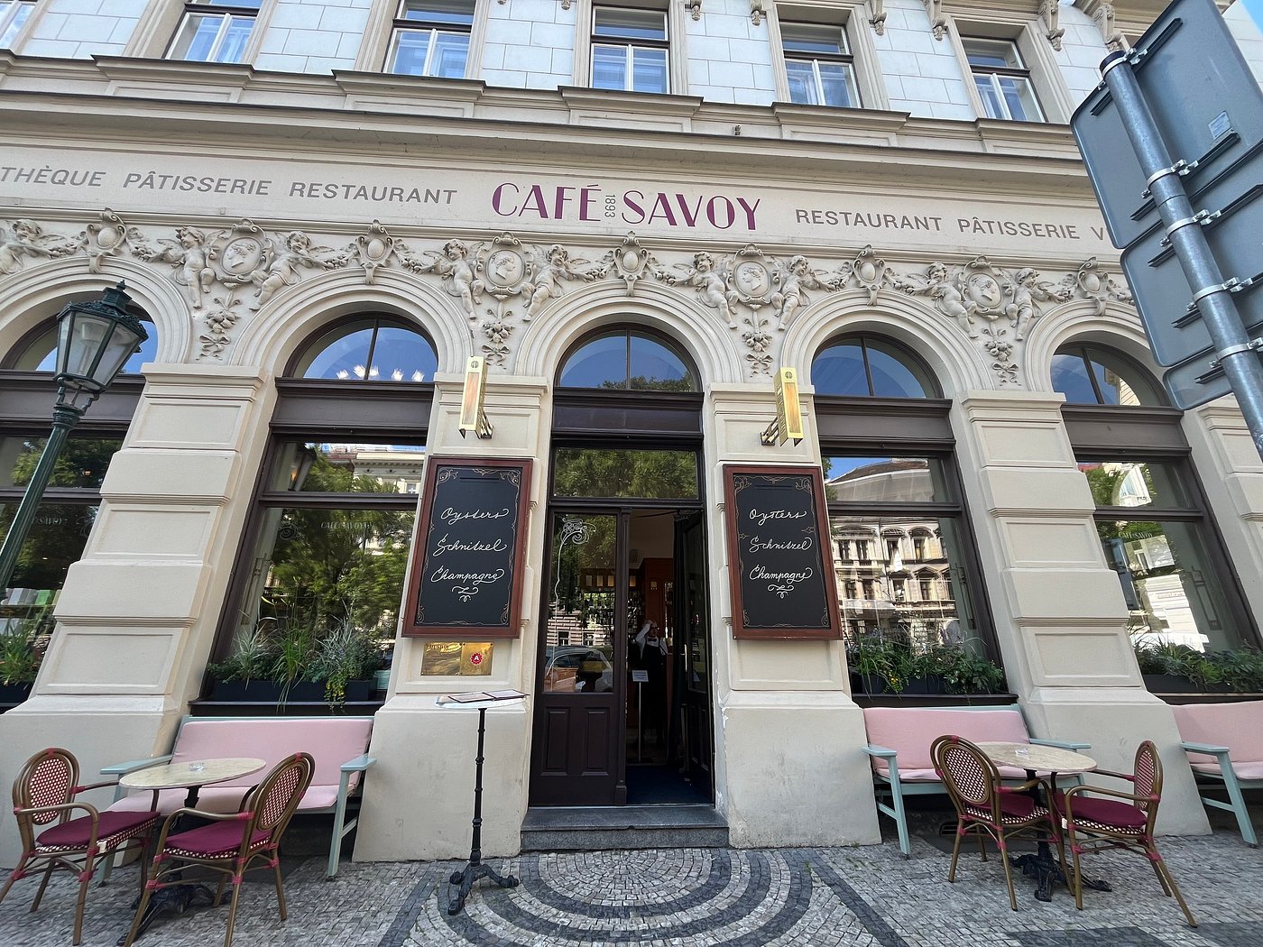 Prague café with high ceilings, Art Nouveau style, and lavish breakfasts.