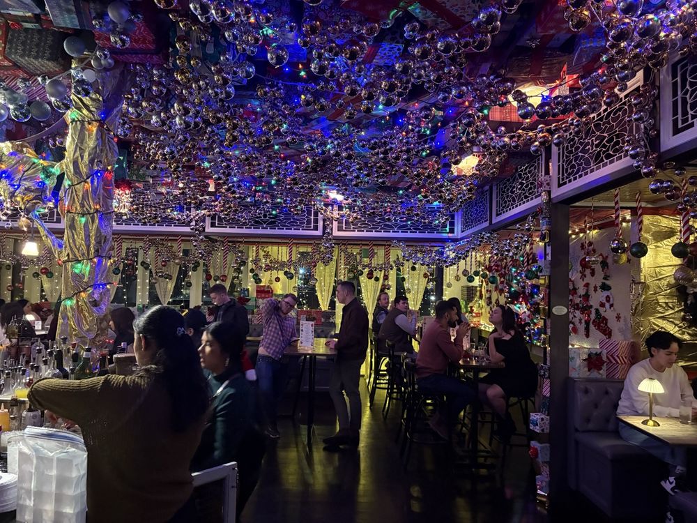 Interior of Julep bar in Houston – stylish craft cocktail lounge with creative garnishes and cozy ambiance